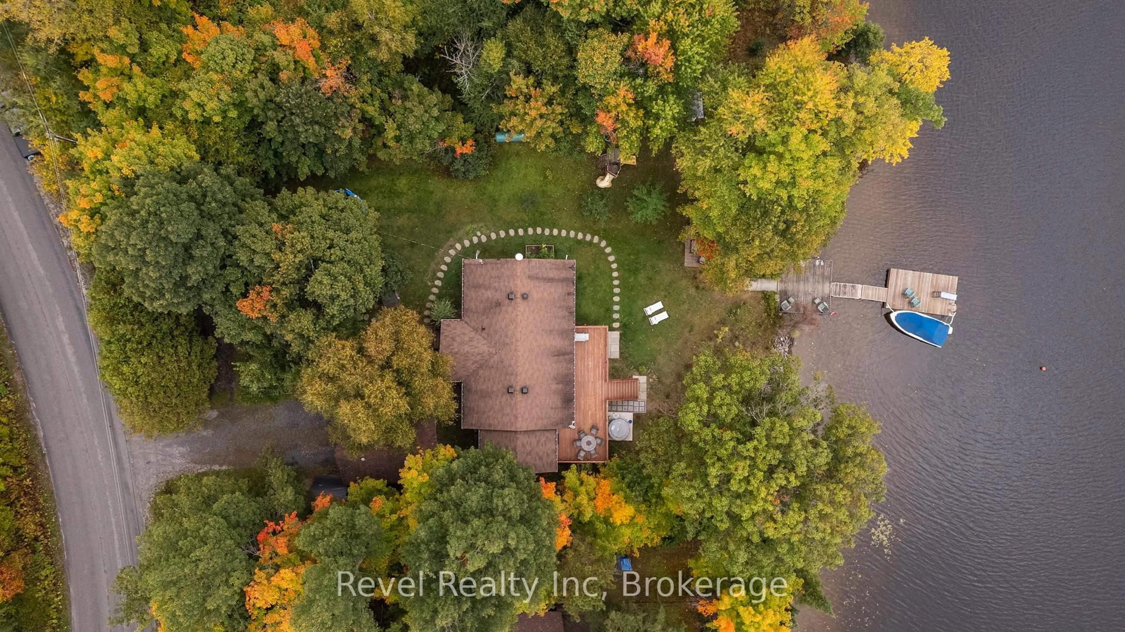 A pic from outside/outdoor area/front of a property/back of a property/a pic from drone, unknown for 210 Burnett's Rd, McKellar Ontario P2A 0B5