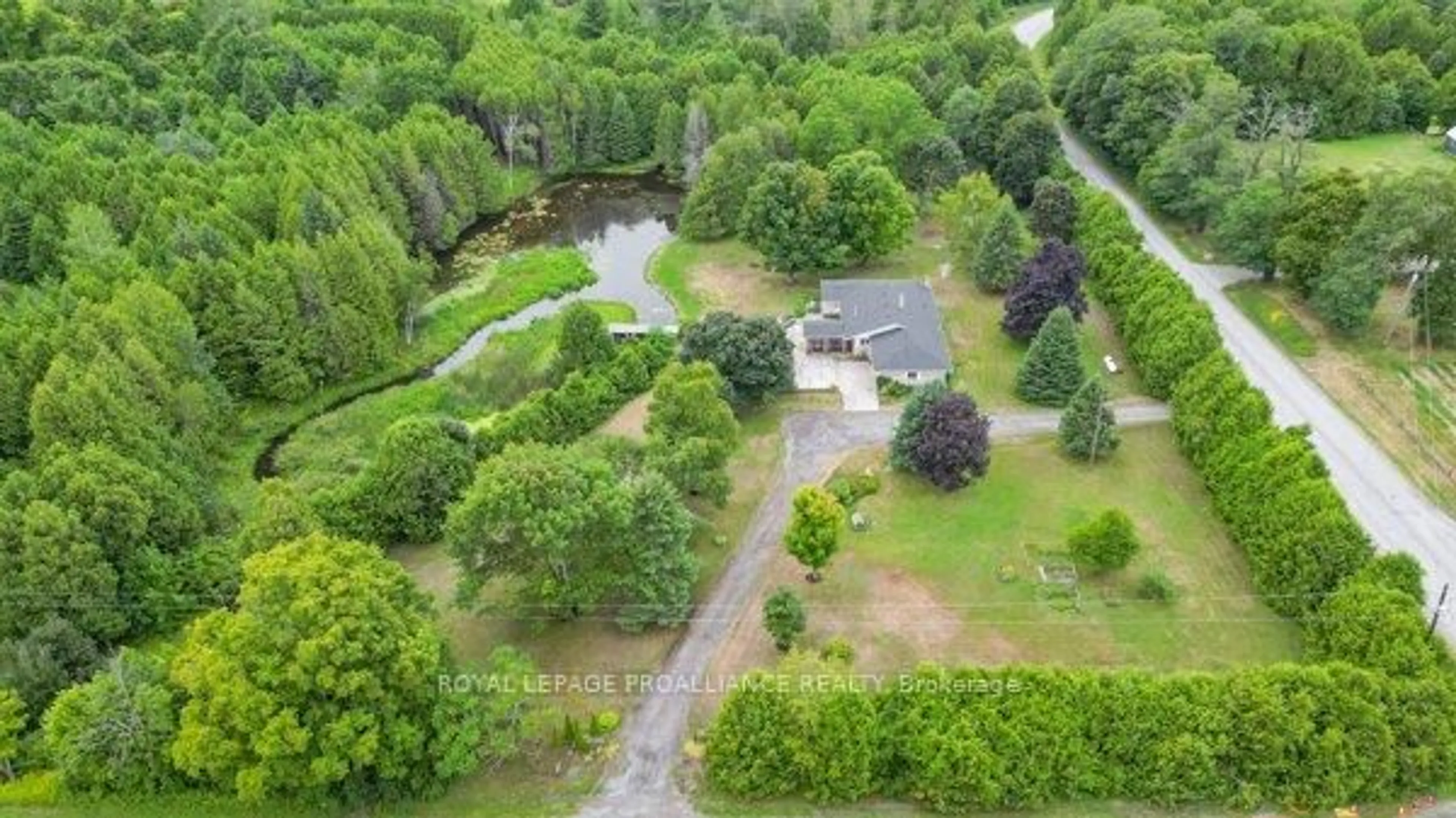 A pic from outside/outdoor area/front of a property/back of a property/a pic from drone, forest/trees view for 486 Waites Rd, Cramahe Ontario K0K 1S0