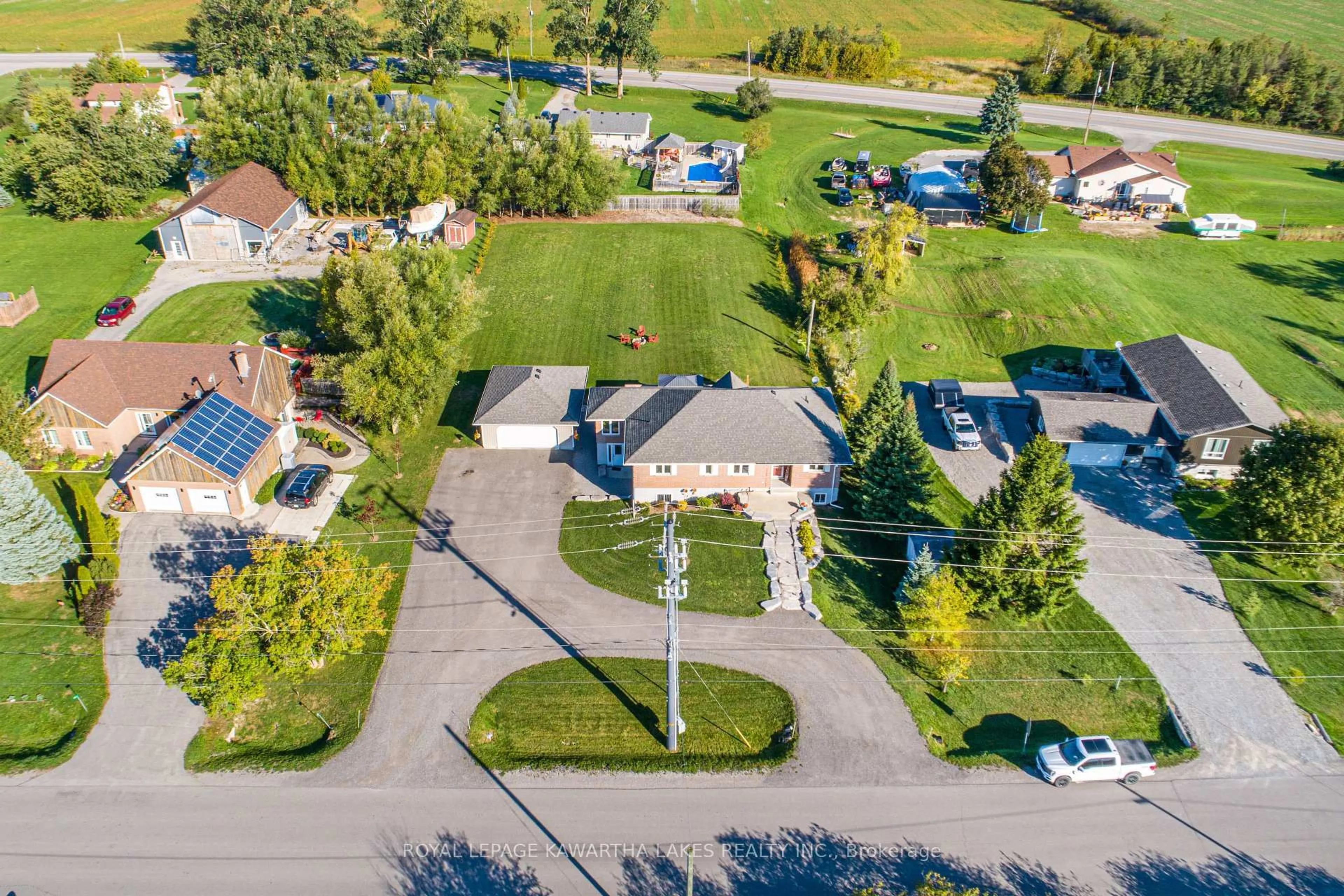 A pic from outside/outdoor area/front of a property/back of a property/a pic from drone, street for 59 Weldon Rd, Kawartha Lakes Ontario K9V 4R6