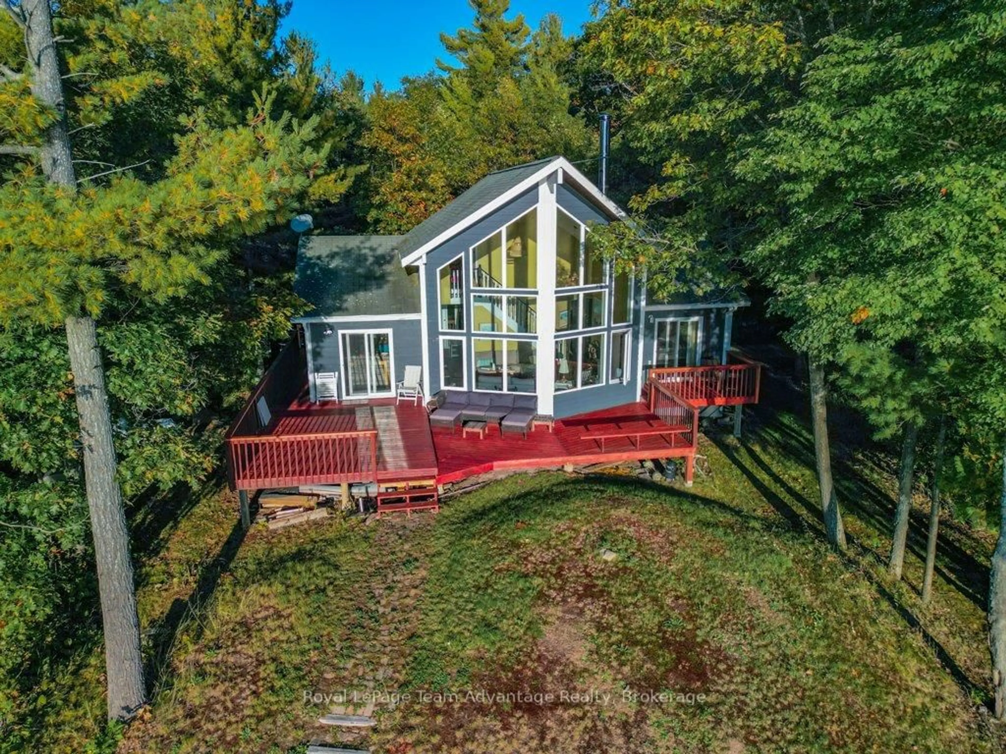A pic from outside/outdoor area/front of a property/back of a property/a pic from drone, water/lake/river/ocean view for 37 Richards Lake Rd, Carling Ontario P0G 1G0