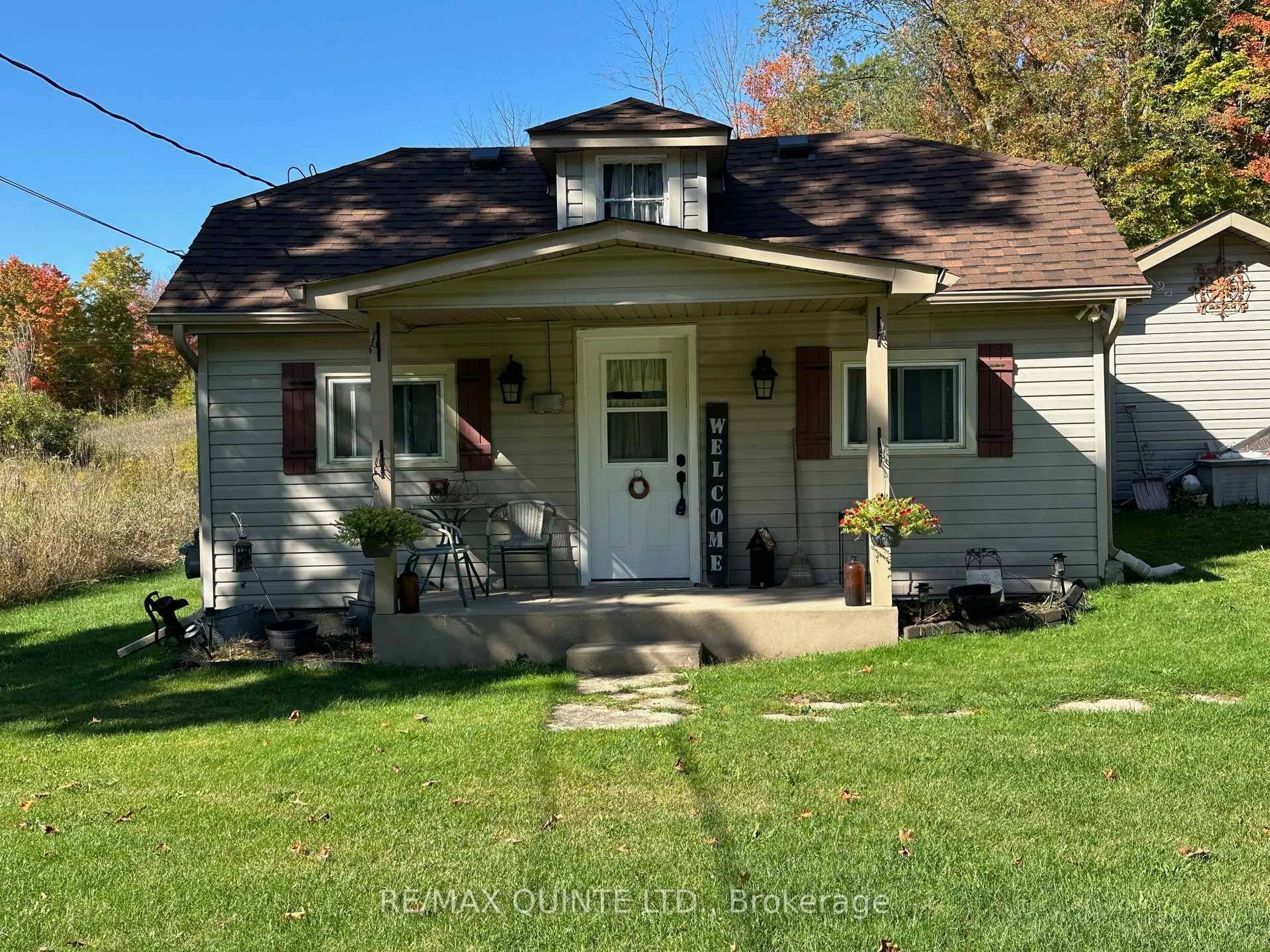 Home with vinyl exterior material, street for 33 Centre Line Rd, Limoges Ontario K0K 2M0
