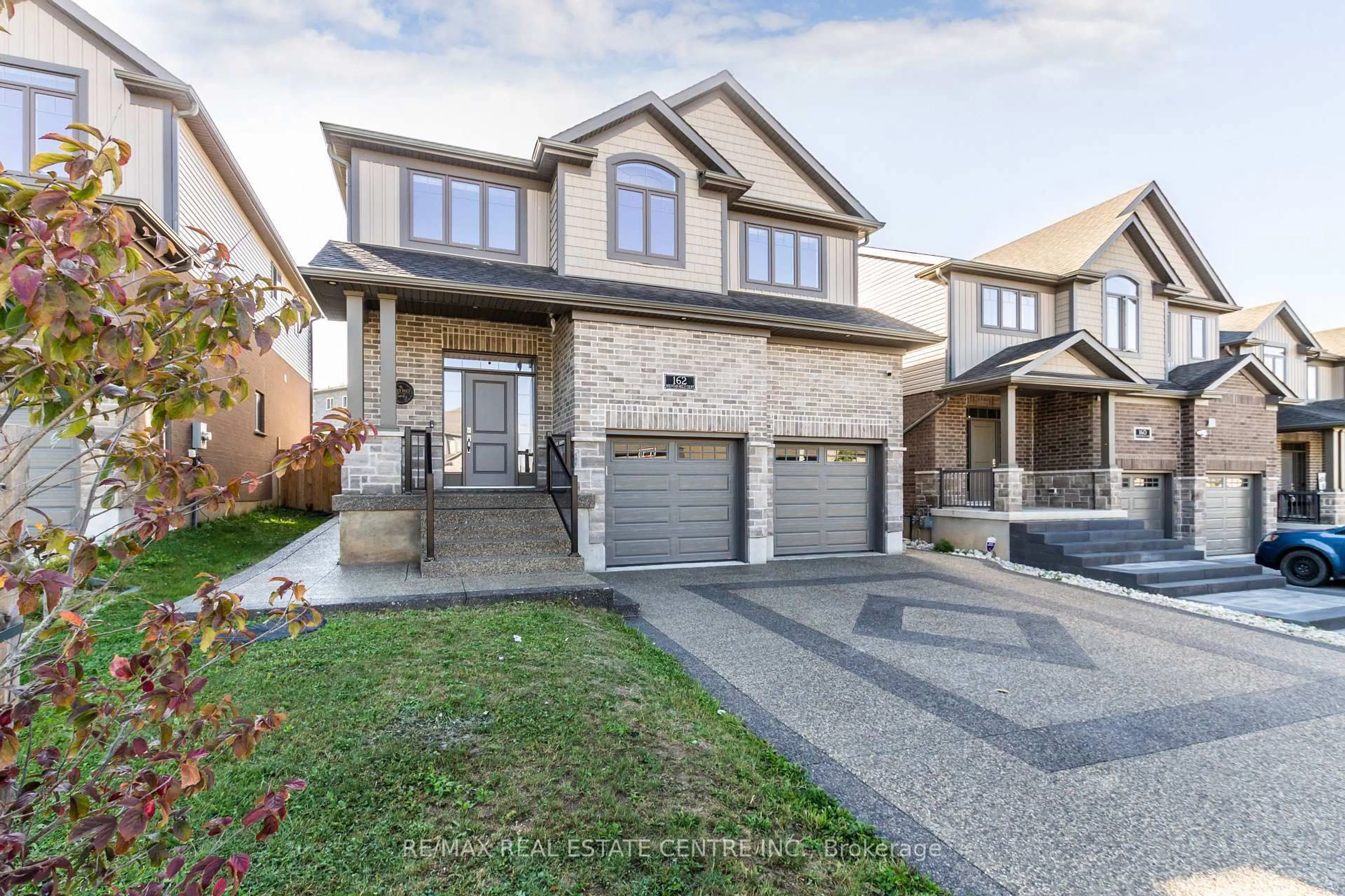 Home with brick exterior material, street for 162 Mountain Holly Crt, Waterloo Ontario N2V 0E1