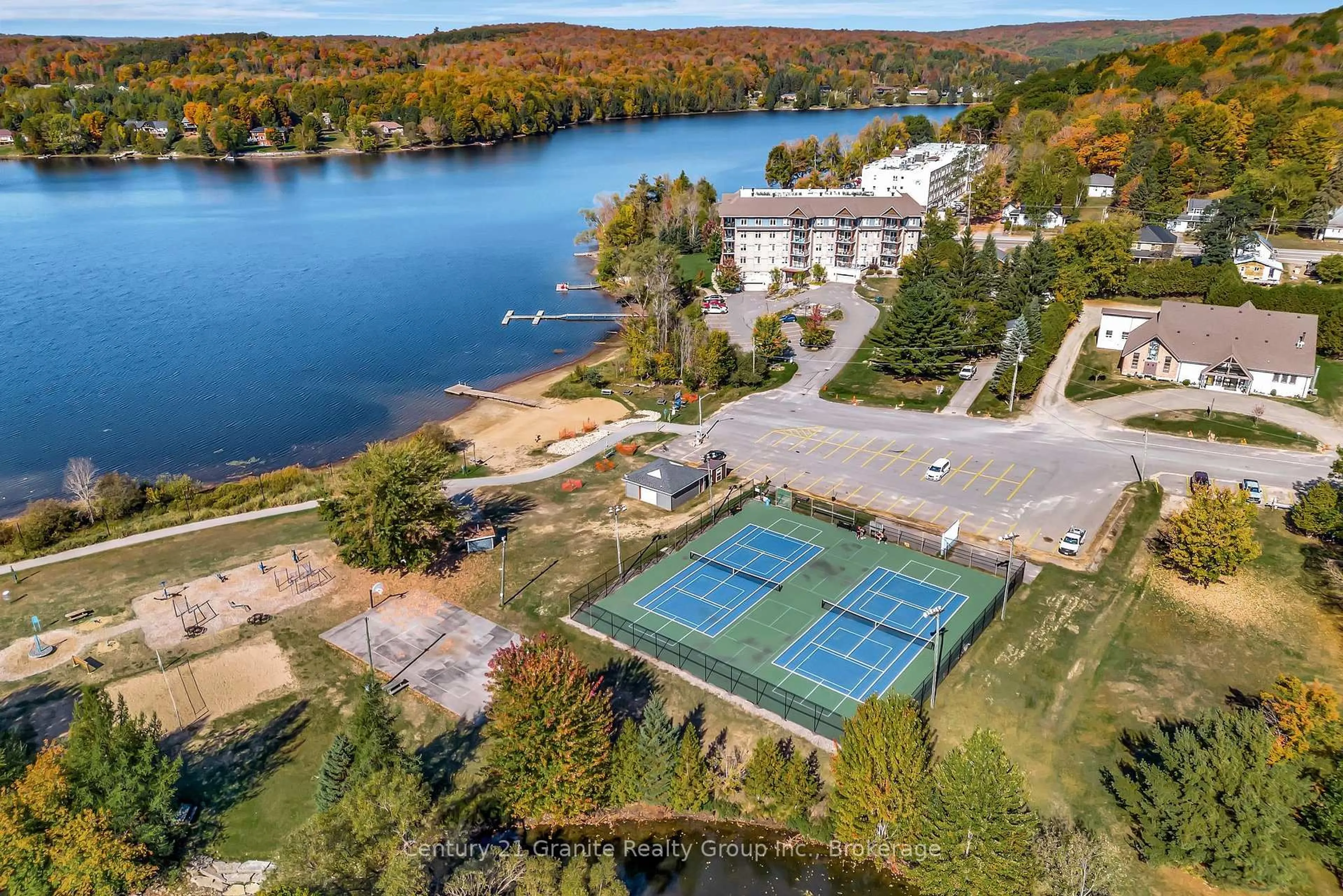 A pic from outside/outdoor area/front of a property/back of a property/a pic from drone, water/lake/river/ocean view for 91 Pine Ave, Dysart et al Ontario K0M 1S0