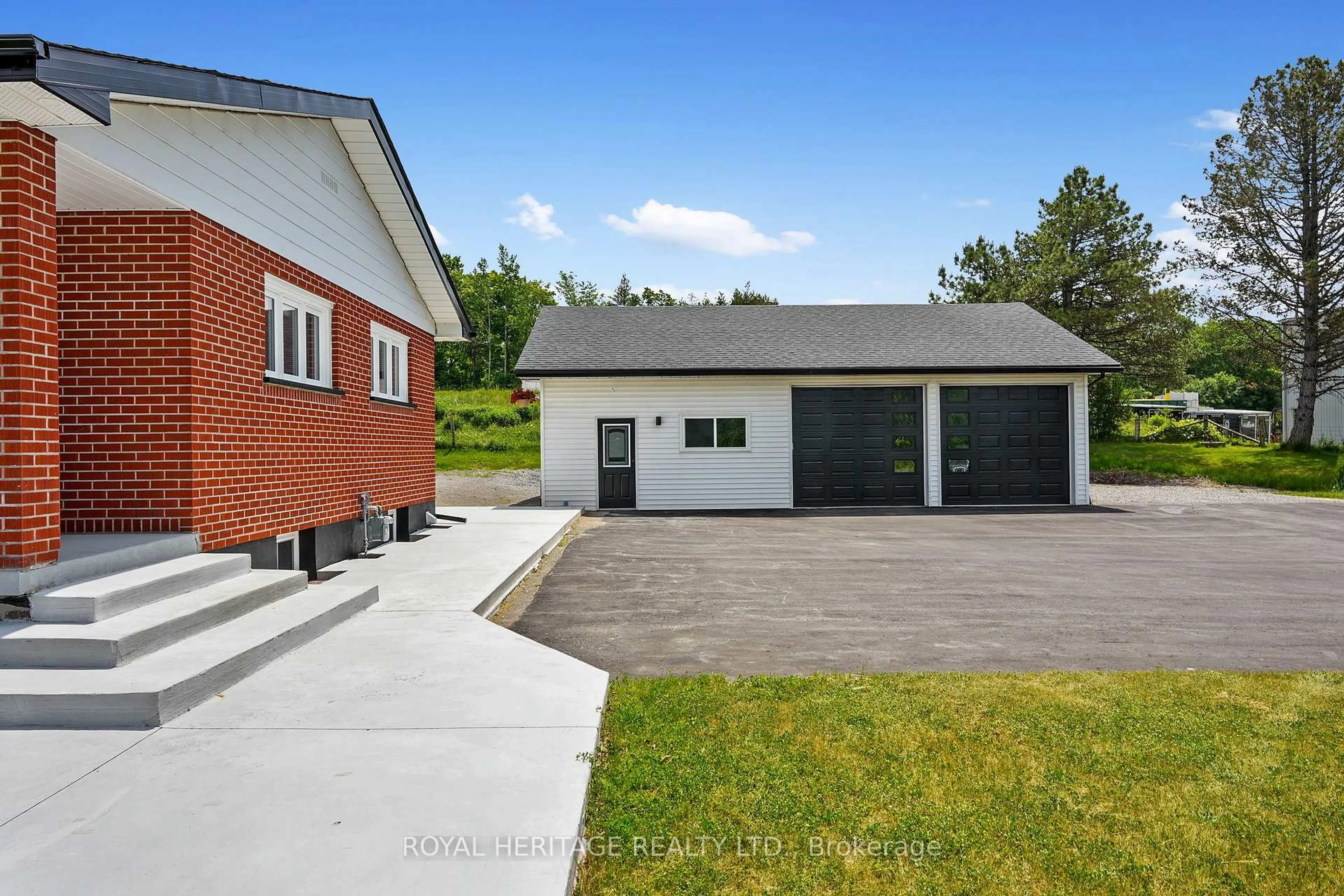 A pic from outside/outdoor area/front of a property/back of a property/a pic from drone, street for 8803 Dale Rd, Hamilton Township Ontario K9A 4J9