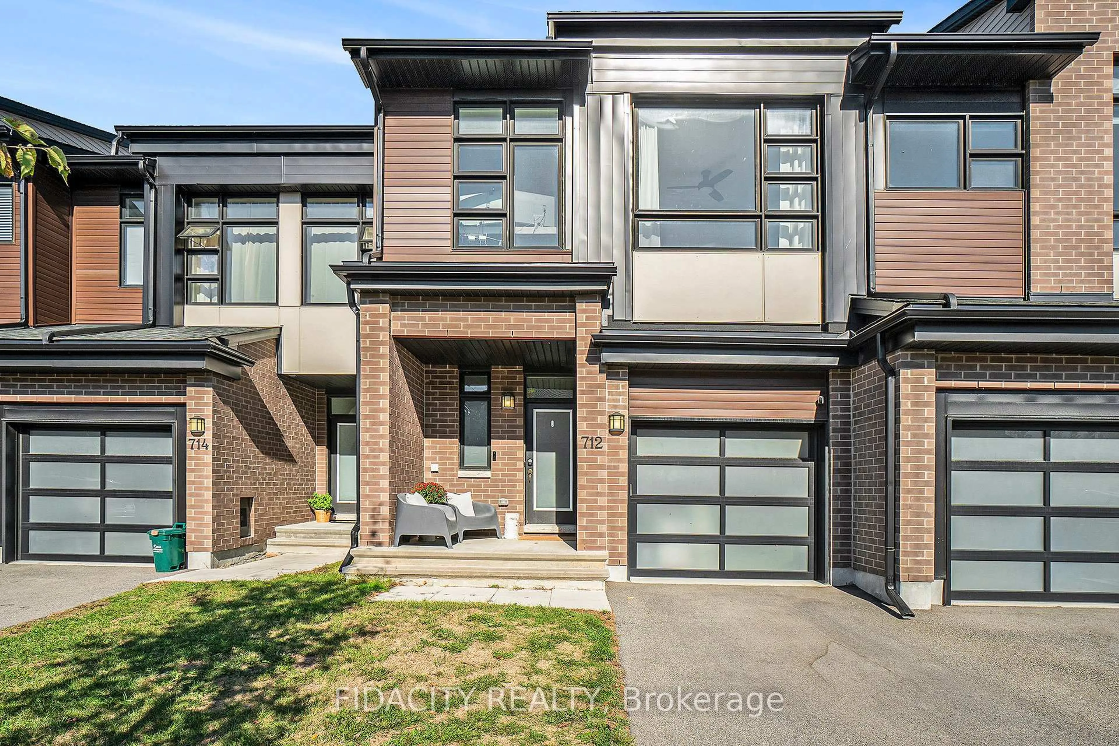 Home with brick exterior material, street for 712 Twist Way, Ottawa Ontario K2V 0M8