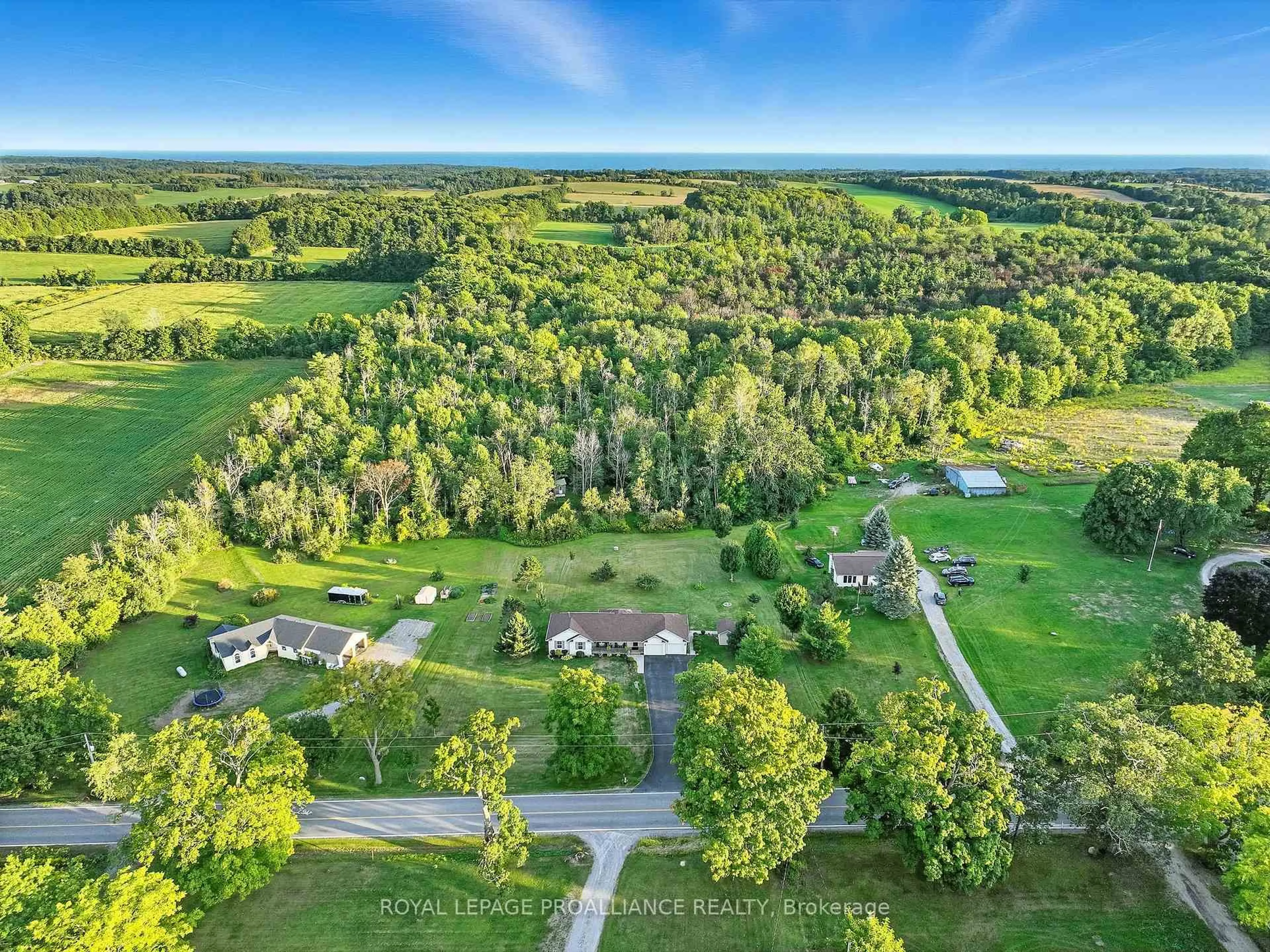 A pic from outside/outdoor area/front of a property/back of a property/a pic from drone, forest/trees view for 13799 County 21 Rd, Cramahe Ontario K0K 1S0