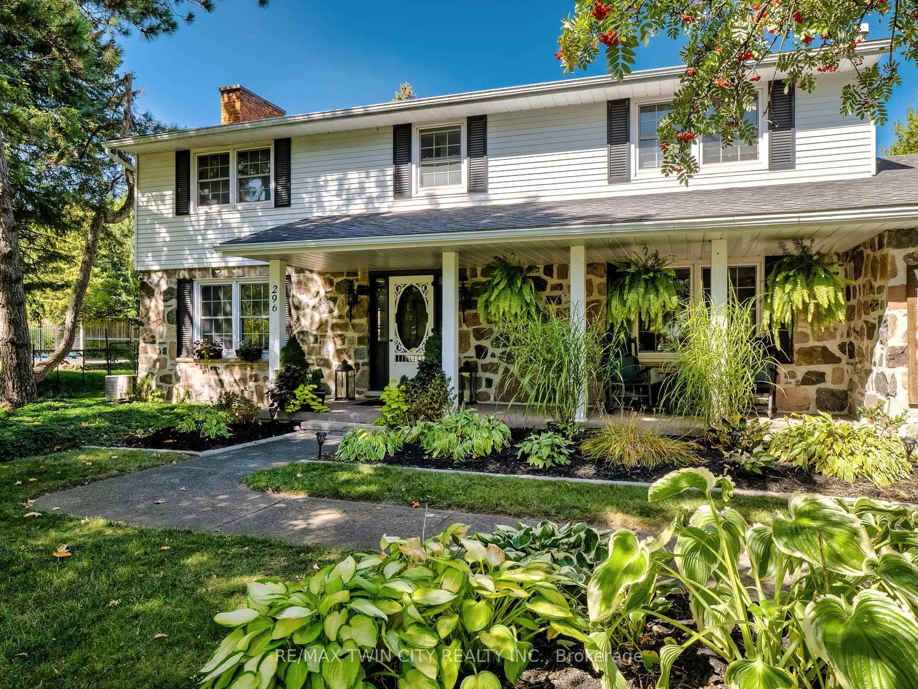 Home with vinyl exterior material, street for 296 Edgehill Dr, Kitchener Ontario N2P 2C9