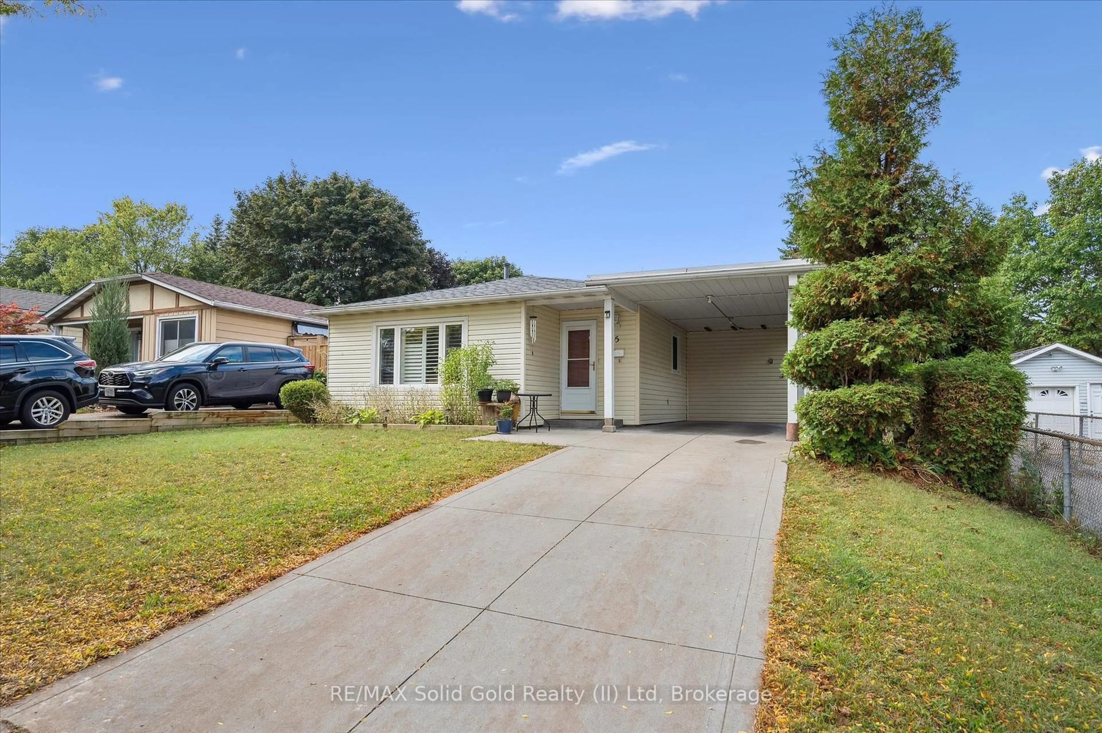 Home with vinyl exterior material, street for 85 Christopher Dr, Waterloo Ontario N2J 4J6