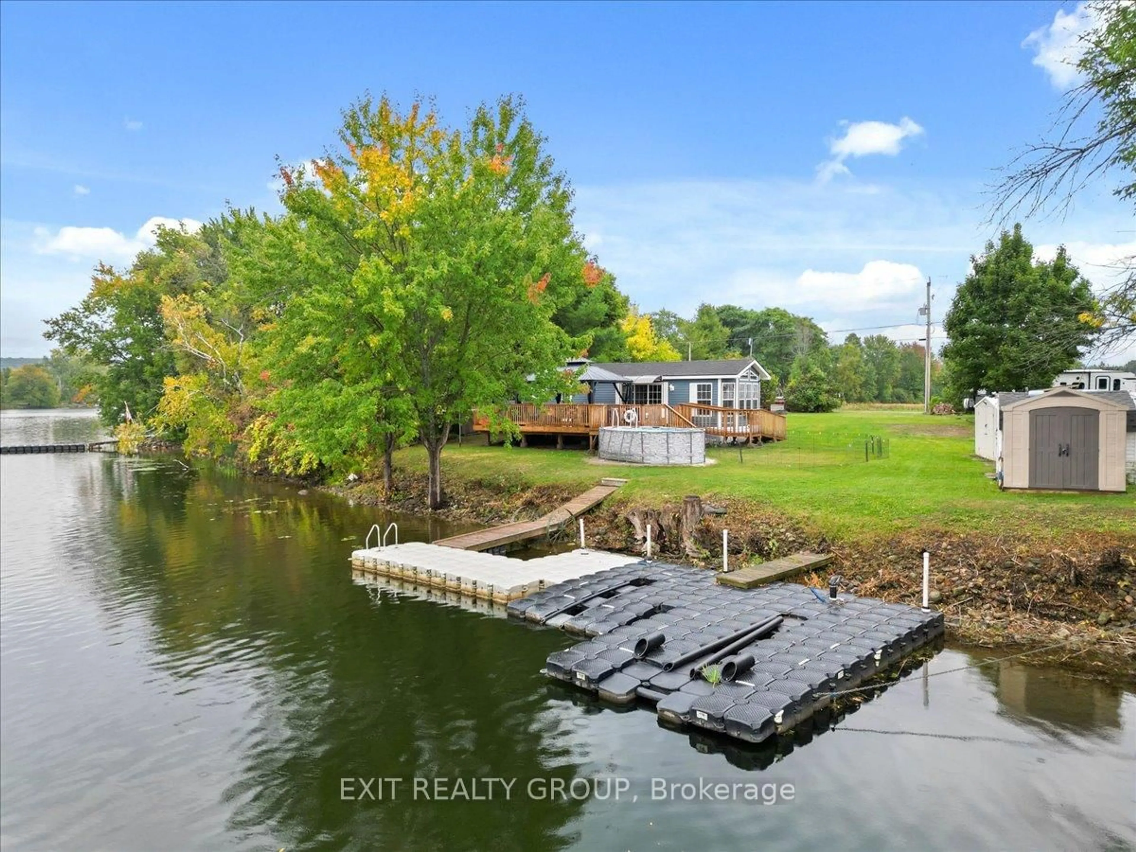 A pic from outside/outdoor area/front of a property/back of a property/a pic from drone, water/lake/river/ocean view for 57 Cooke Lane, Hastings Ontario K0K 2C0