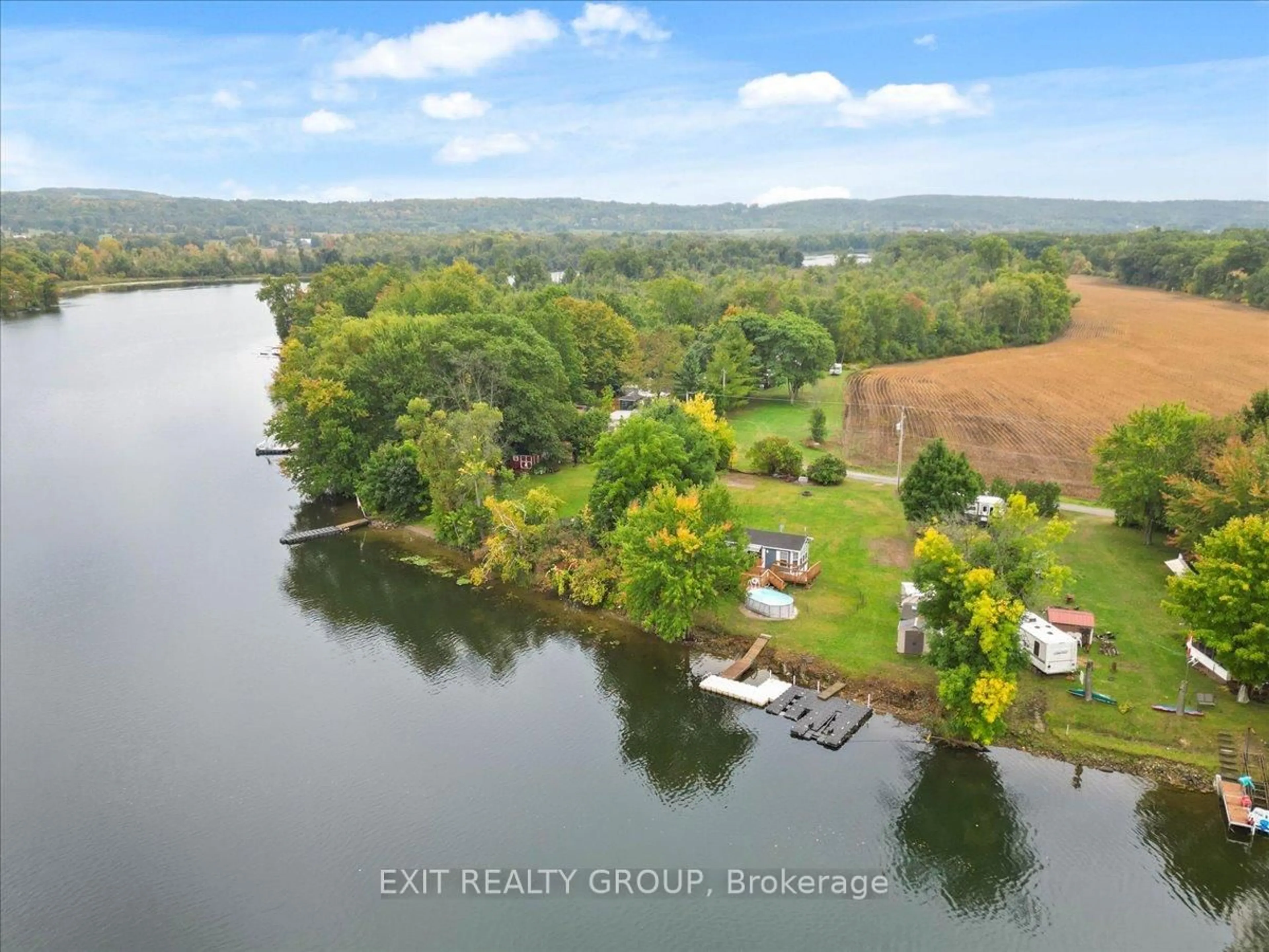 A pic from outside/outdoor area/front of a property/back of a property/a pic from drone, water/lake/river/ocean view for 57 Cooke Lane, Hastings Ontario K0K 2C0