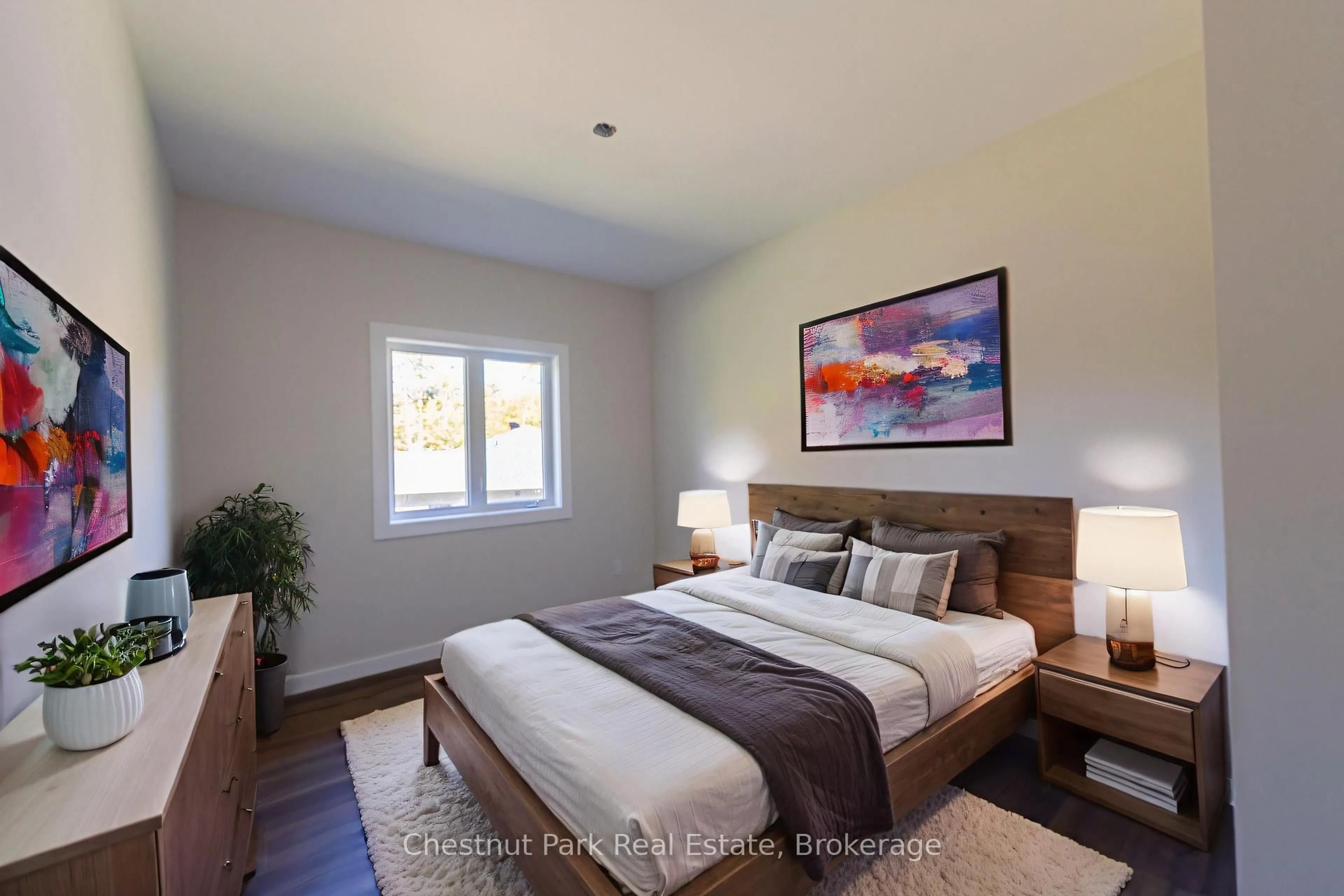 Bedroom with bed, wood/laminate floor for 26 Aspen Lane, Nipissing Ontario P0H 1Z0