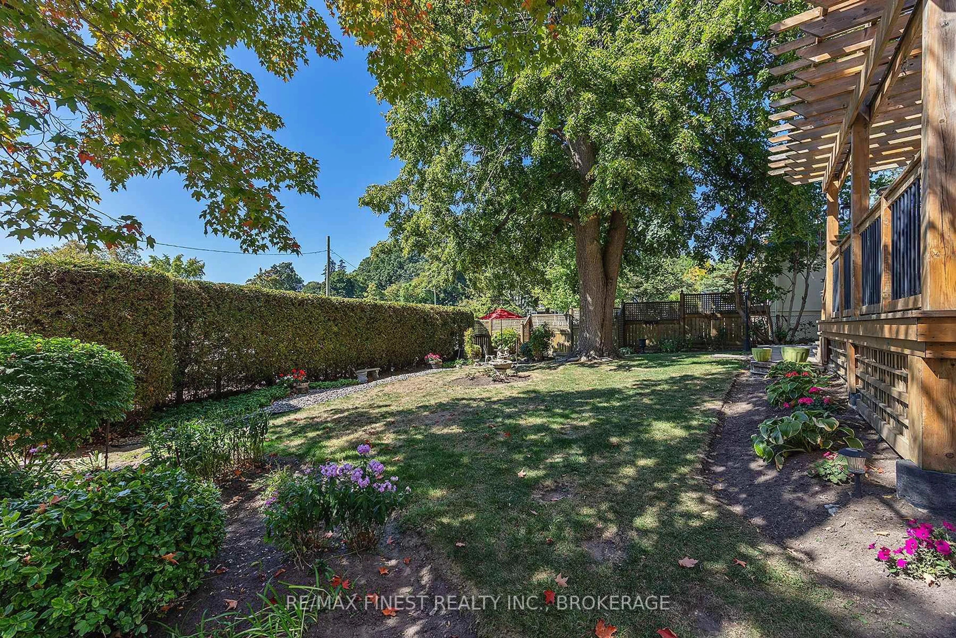 A pic from outside/outdoor area/front of a property/back of a property/a pic from drone, forest/trees view for 80 Market St, Gananoque Ontario K7G 2M3