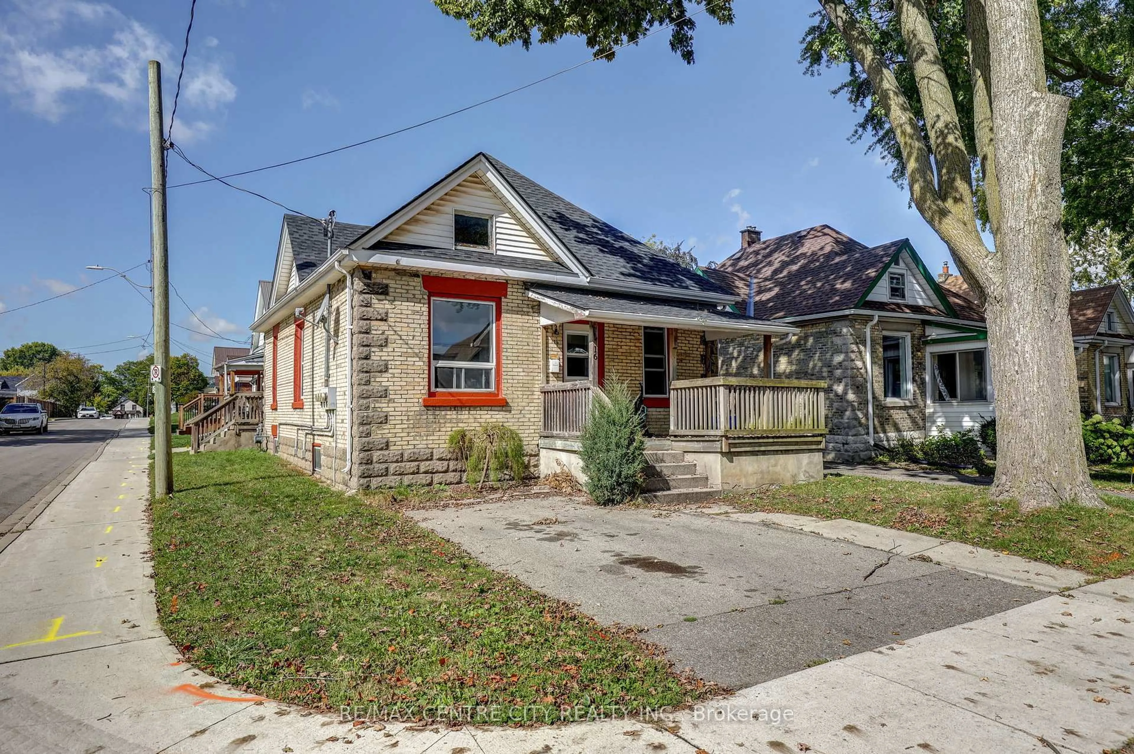 Home with brick exterior material, street for 16 Woodworth Ave, St. Thomas Ontario N5P 3J4