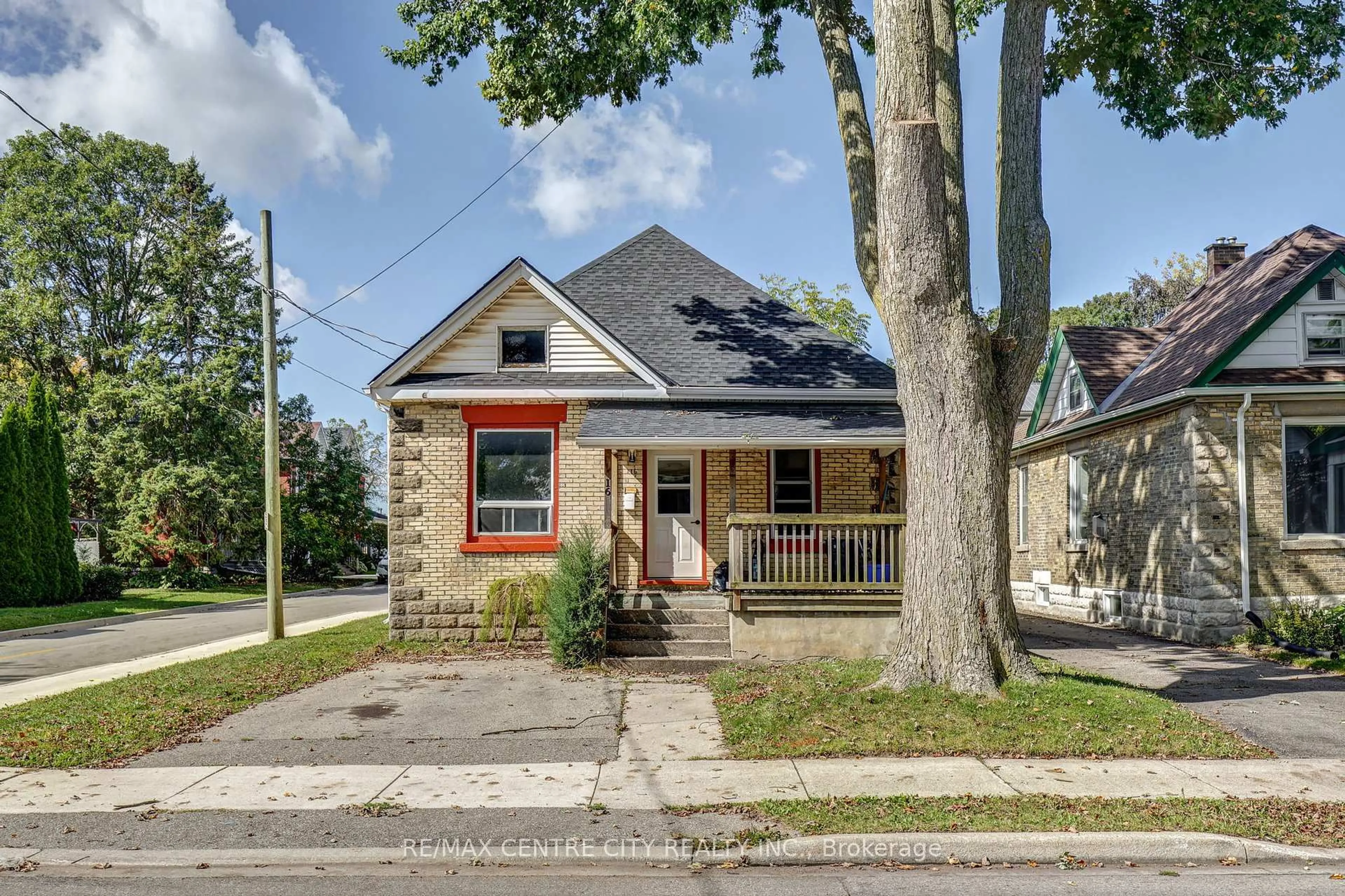 Home with brick exterior material, street for 16 Woodworth Ave, St. Thomas Ontario N5P 3J4