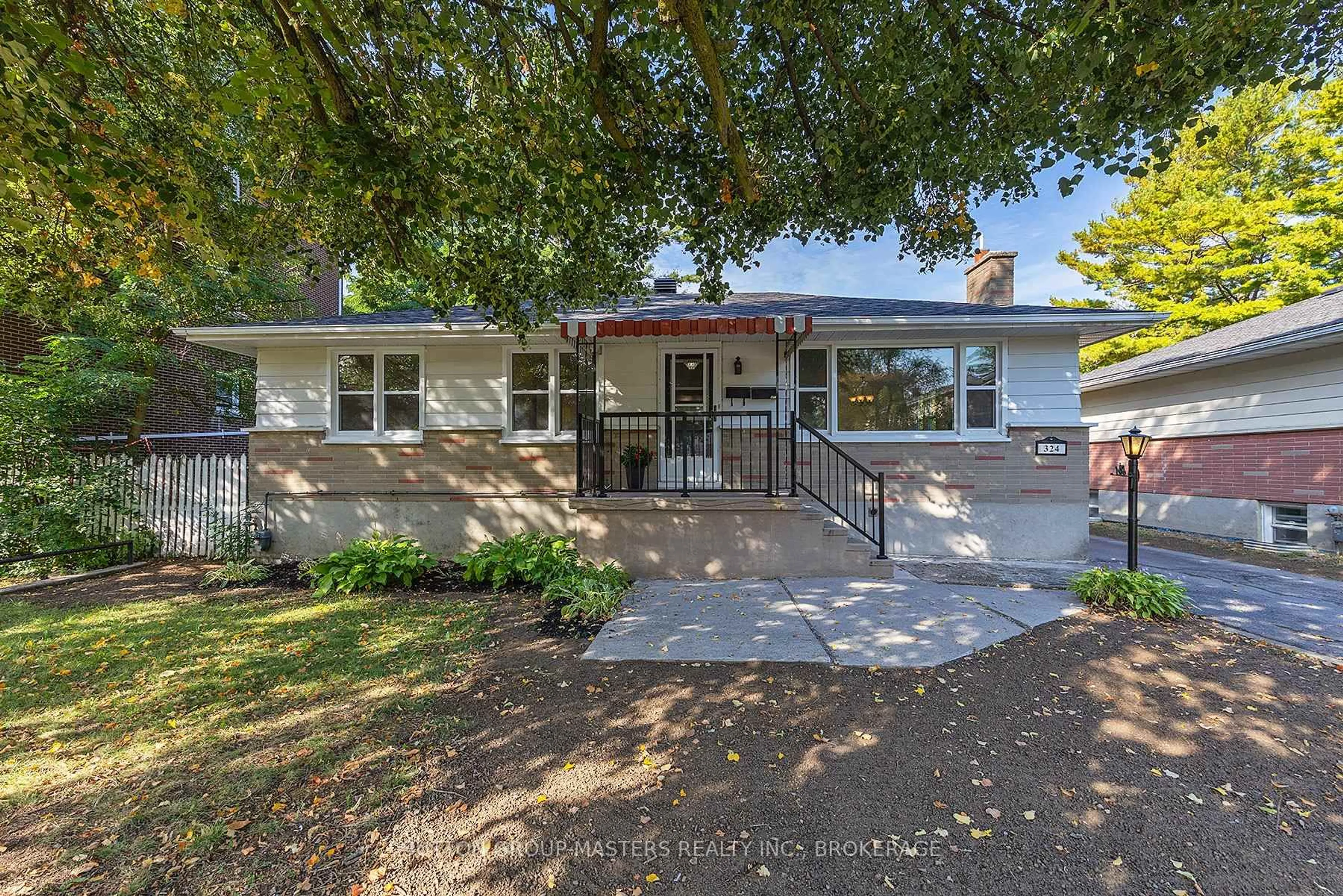Home with vinyl exterior material, street for 324 Yonge St, Kingston Ontario K7M 1G7