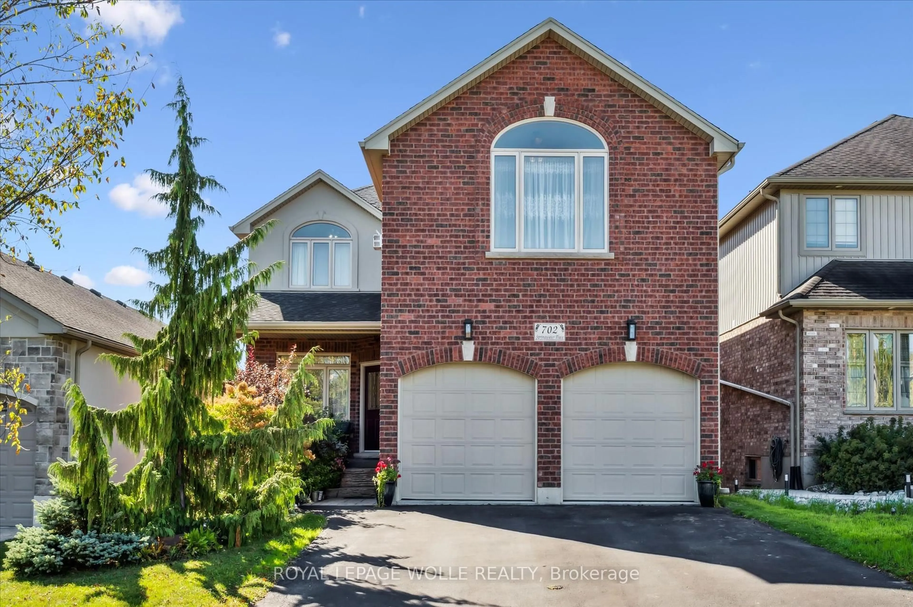 Home with brick exterior material, street for 702 Springwater Pl, Waterloo Ontario N2V 2S5