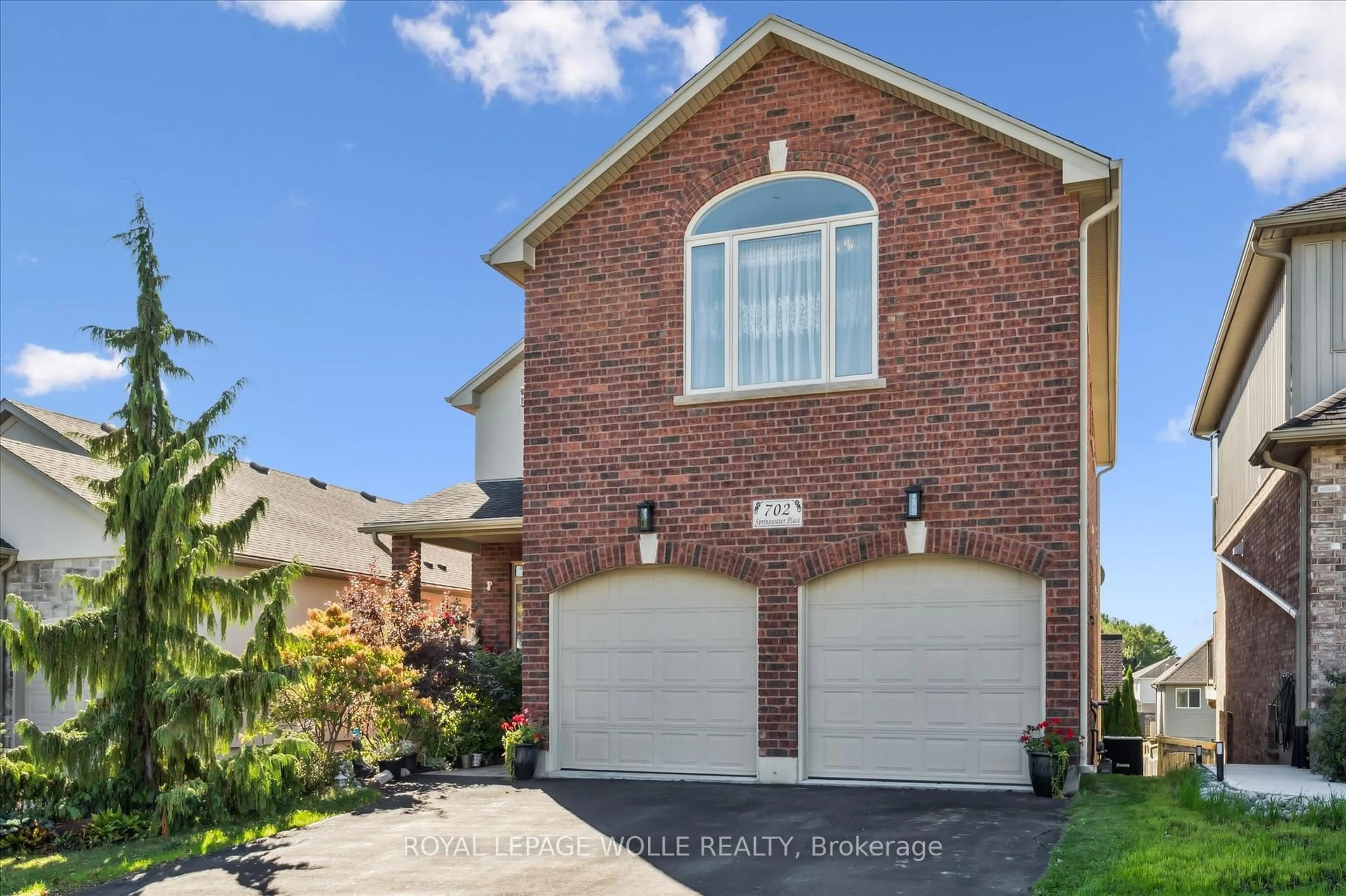 Home with brick exterior material, street for 702 Springwater Pl, Waterloo Ontario N2V 2S5