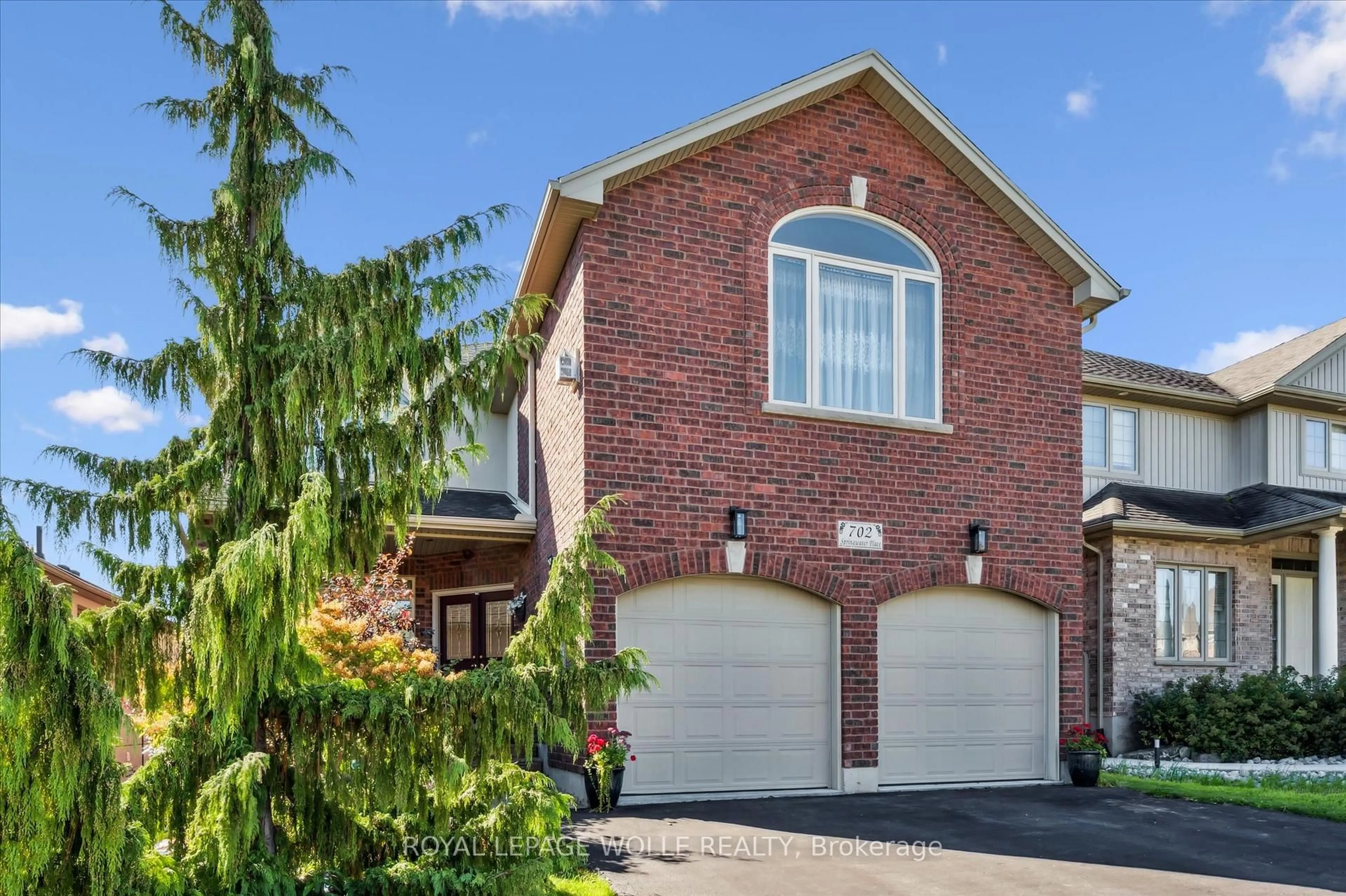 Home with brick exterior material, street for 702 Springwater Pl, Waterloo Ontario N2V 2S5