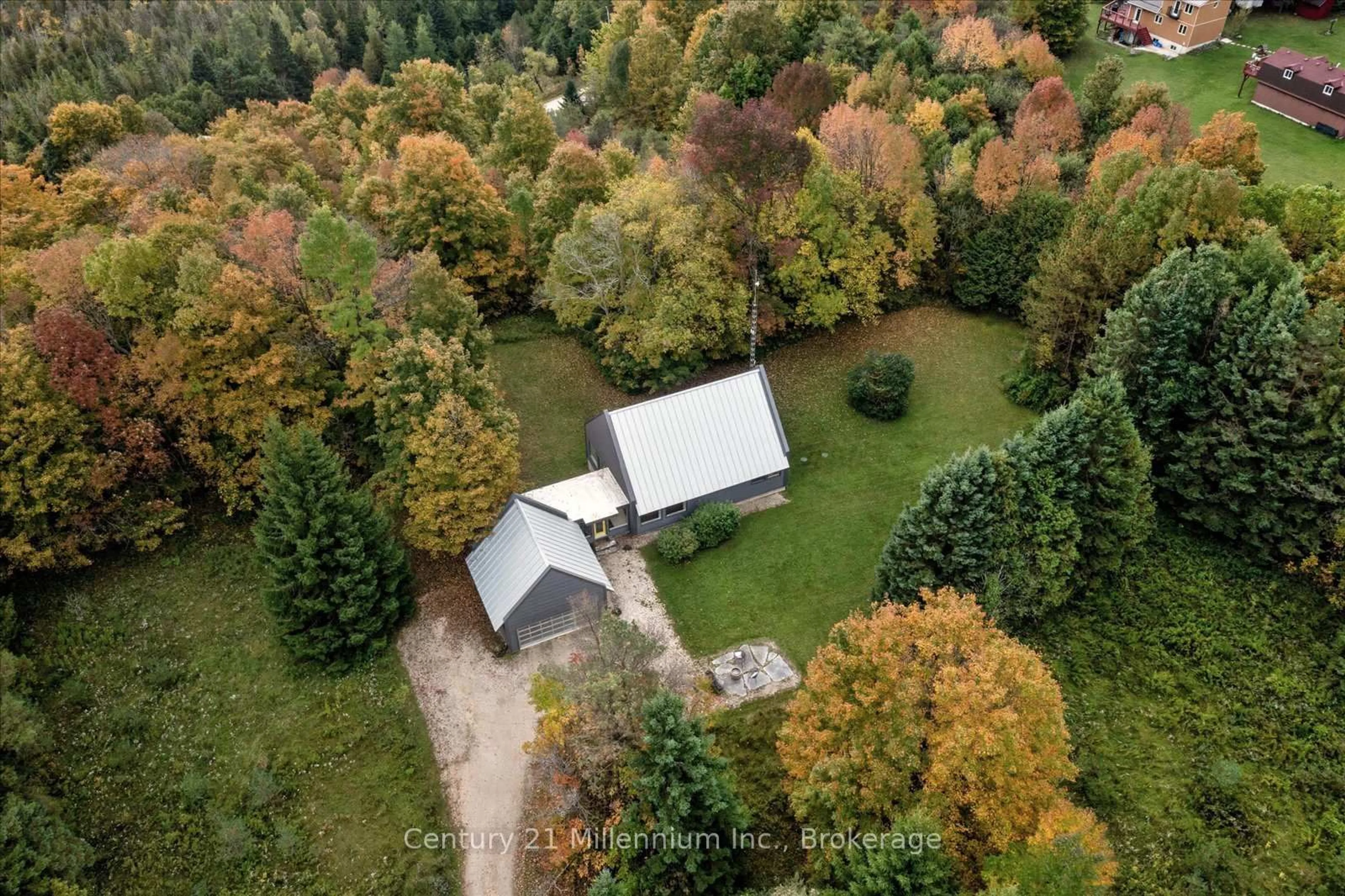 A pic from outside/outdoor area/front of a property/back of a property/a pic from drone, forest/trees view for 360592 Road 160 Rd, Grey Highlands Ontario N0C 1E0