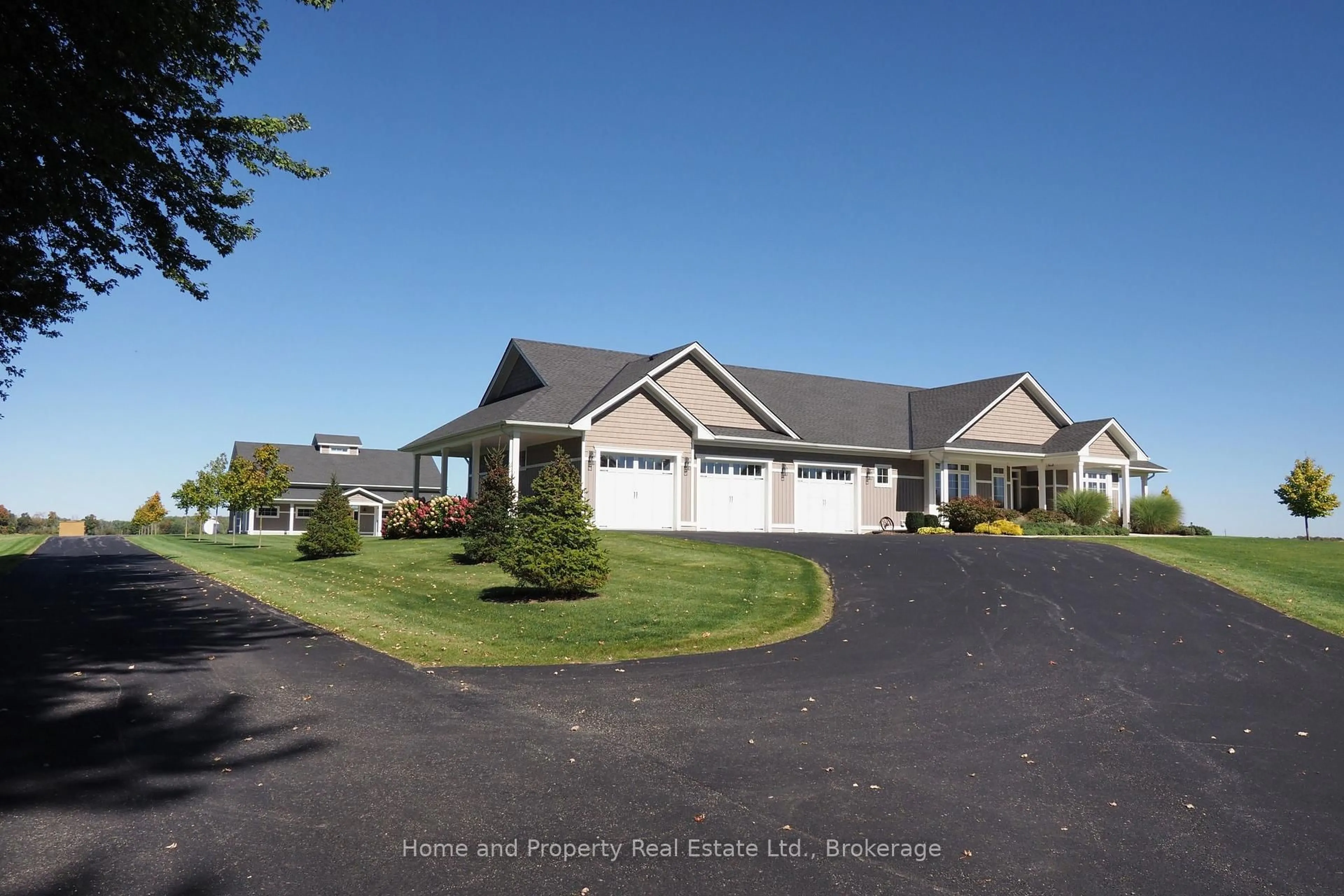 A pic from outside/outdoor area/front of a property/back of a property/a pic from drone, unknown for 5434 7th Line, Minto Ontario N0G 1Z0