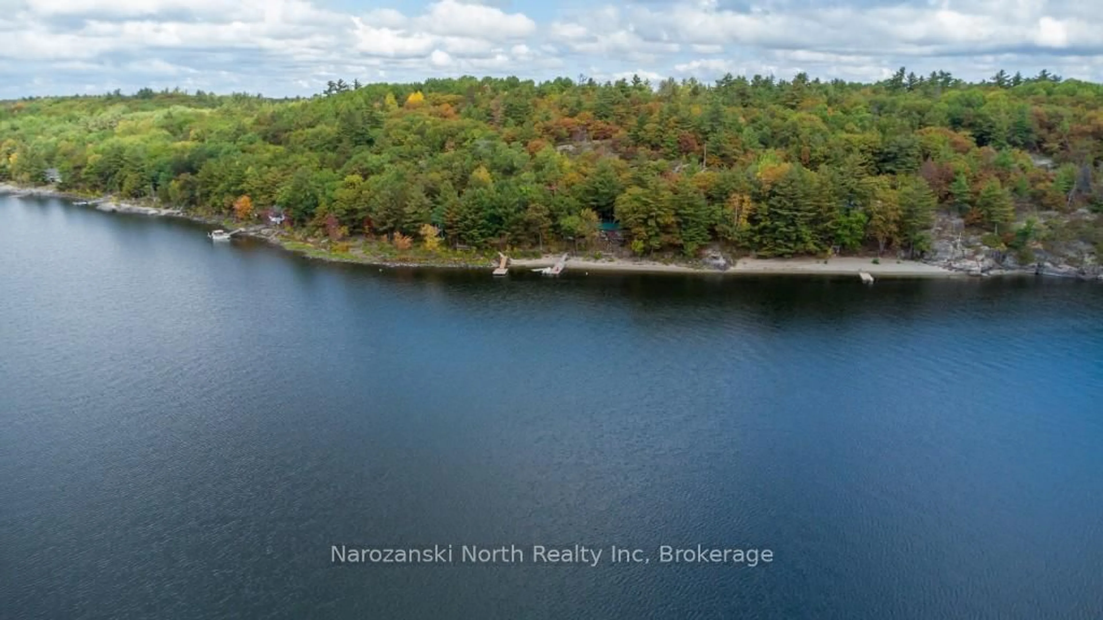 A pic from outside/outdoor area/front of a property/back of a property/a pic from drone, water/lake/river/ocean view for 23 Four Mile Island, French River Ontario P0M 1A0