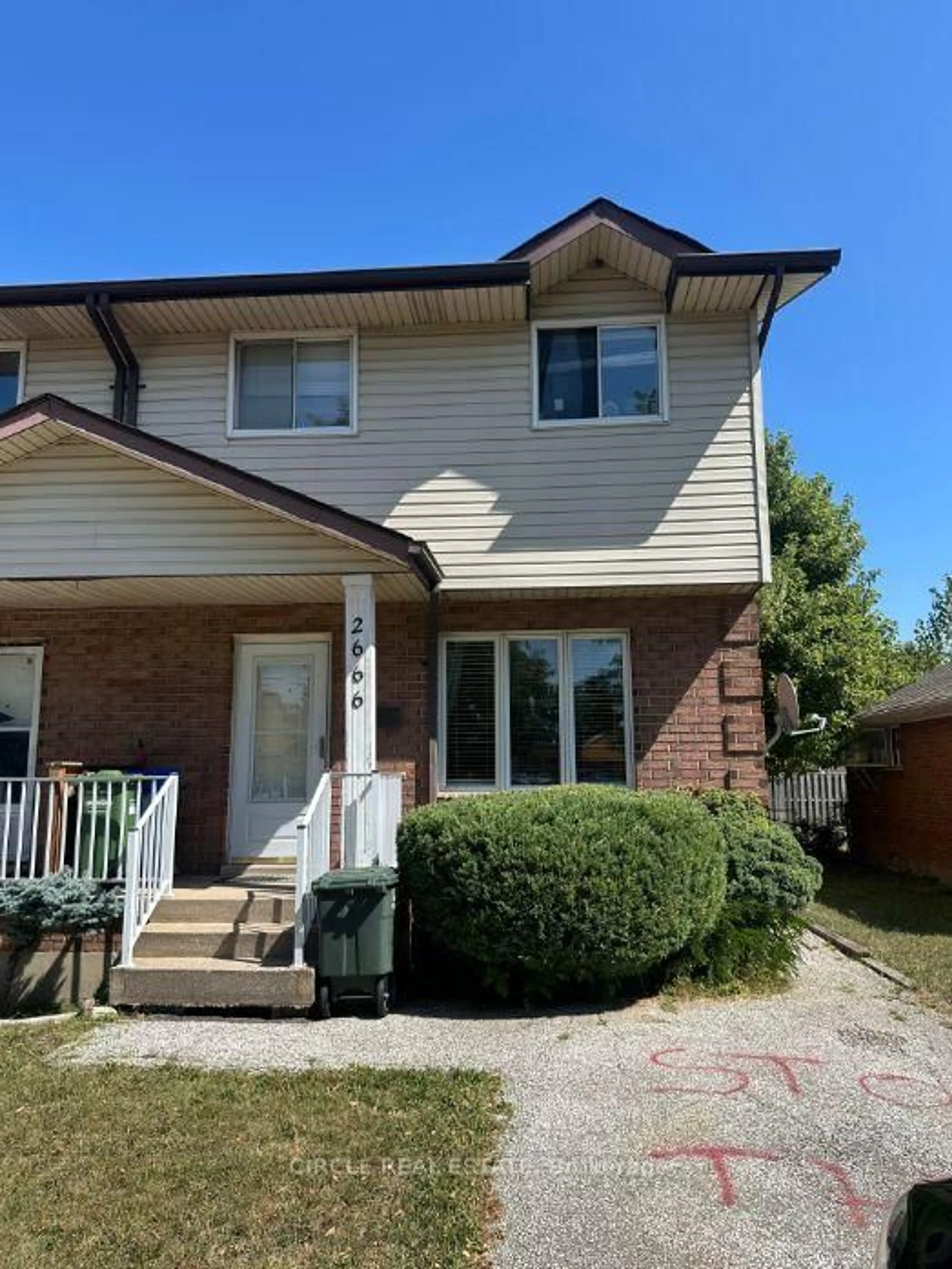 Home with brick exterior material, street for 2666 Lauzon Rd, Windsor Ontario N8T 2Z6