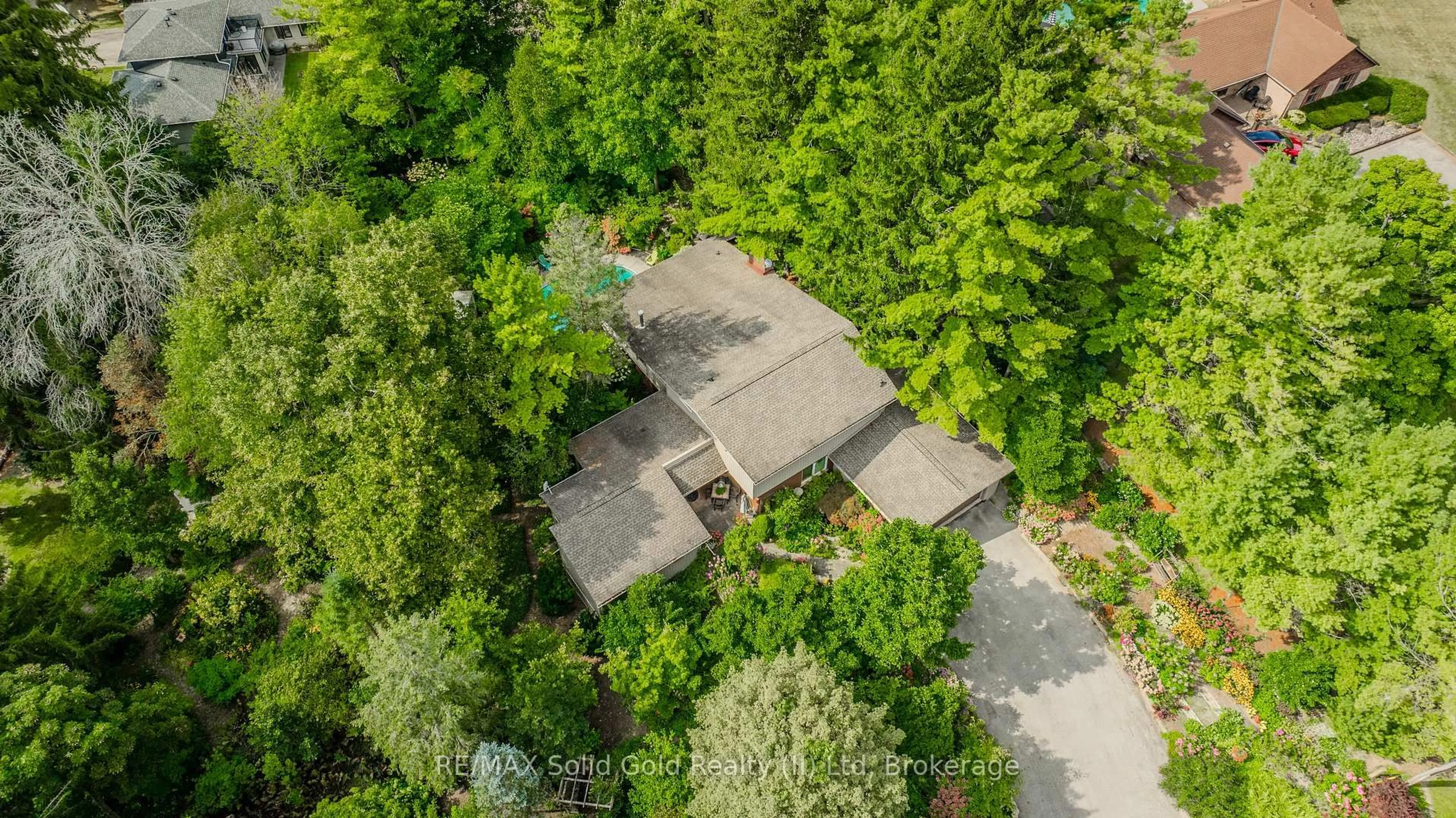 A pic from outside/outdoor area/front of a property/back of a property/a pic from drone, forest/trees view for 111 Grandview Dr, Woolwich Ontario N0B 1N0