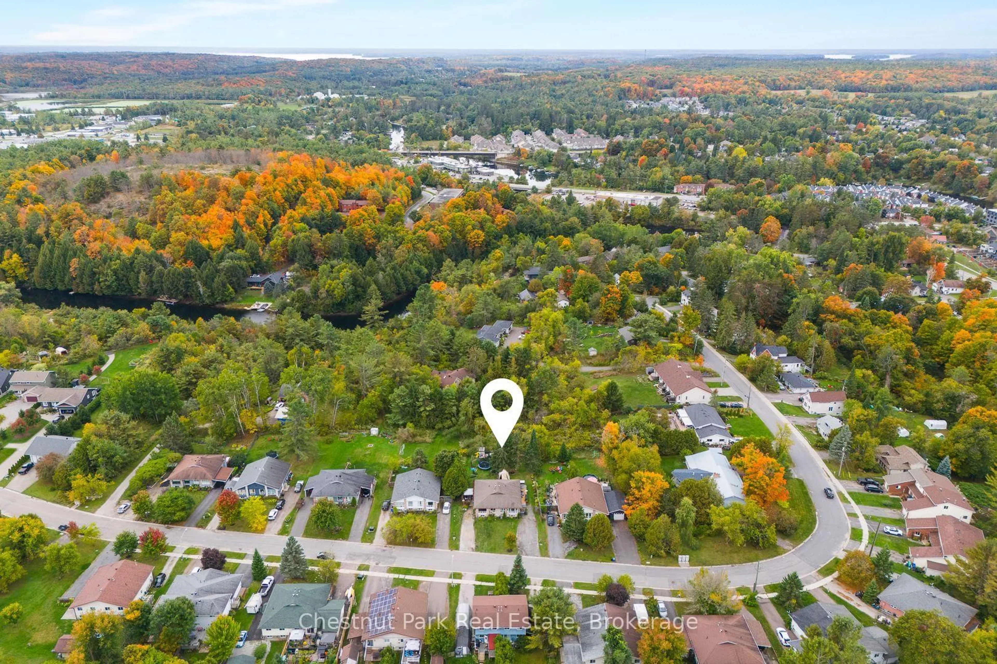 A pic from outside/outdoor area/front of a property/back of a property/a pic from drone, forest/trees view for 70 Milton St, Bracebridge Ontario P1L 1G9