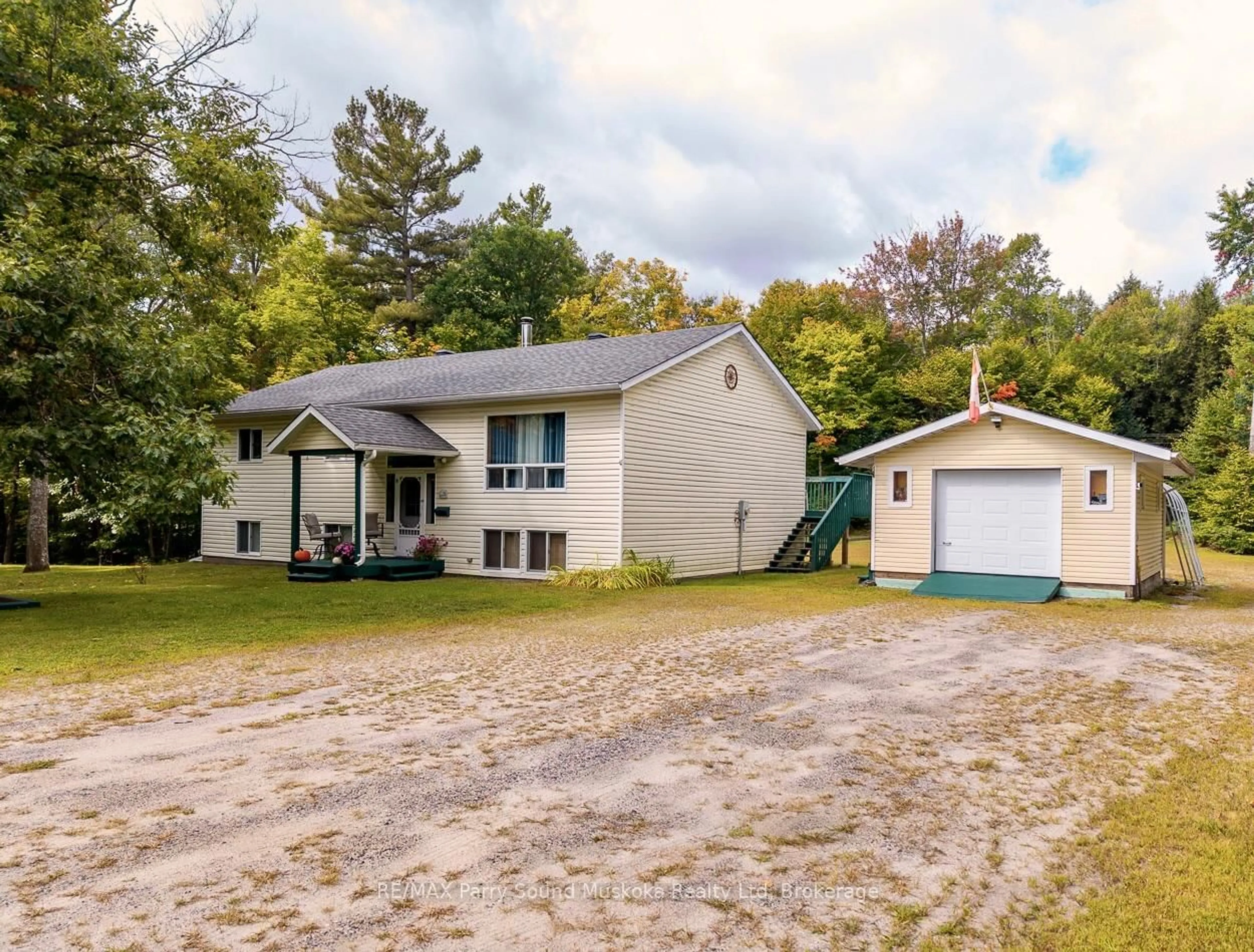 A pic from outside/outdoor area/front of a property/back of a property/a pic from drone, street for 59 Black Rd, Seguin Ontario P2A 2W8