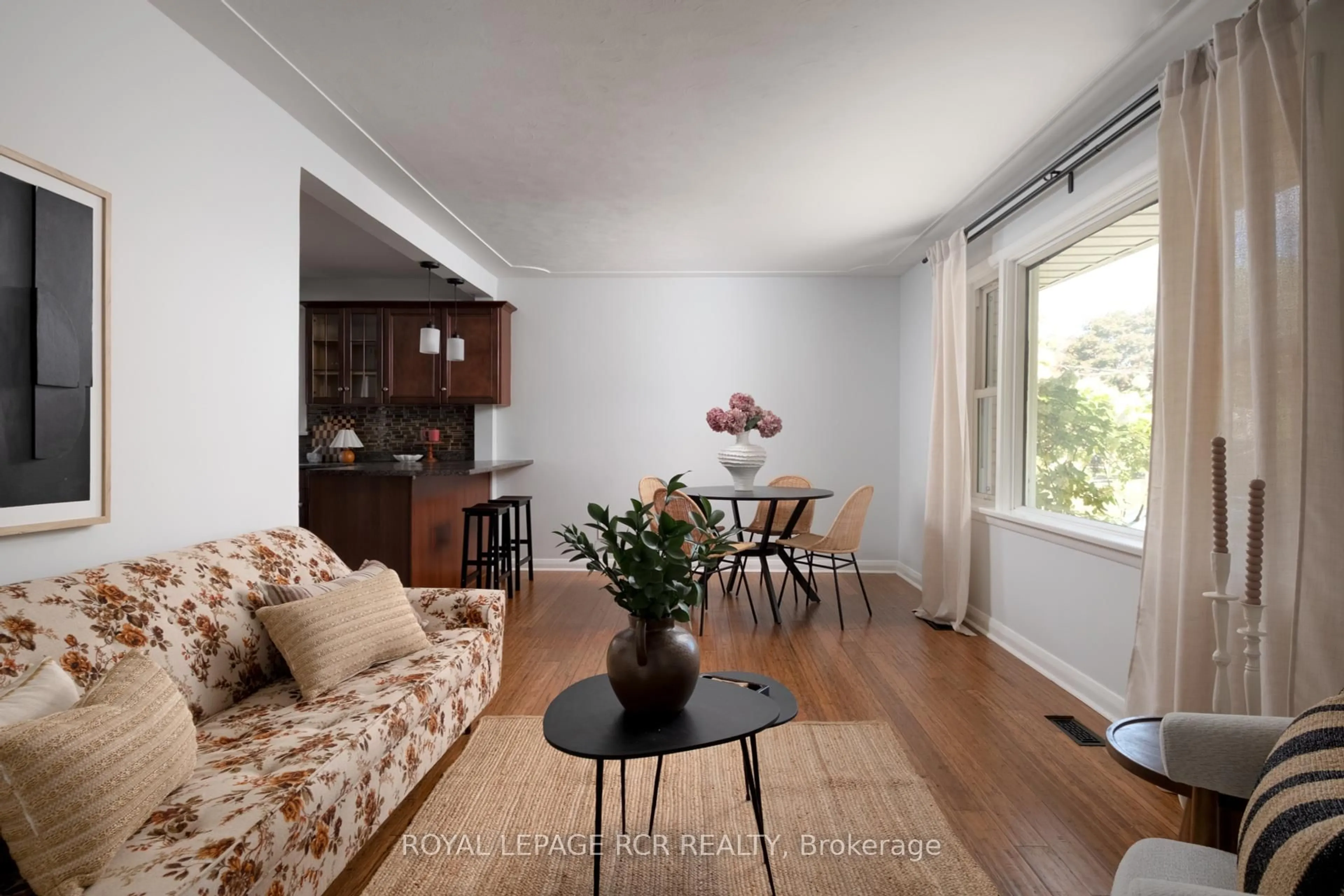 Living room with furniture, wood/laminate floor for 85 Ellis Cres, Waterloo Ontario N2J 2B8