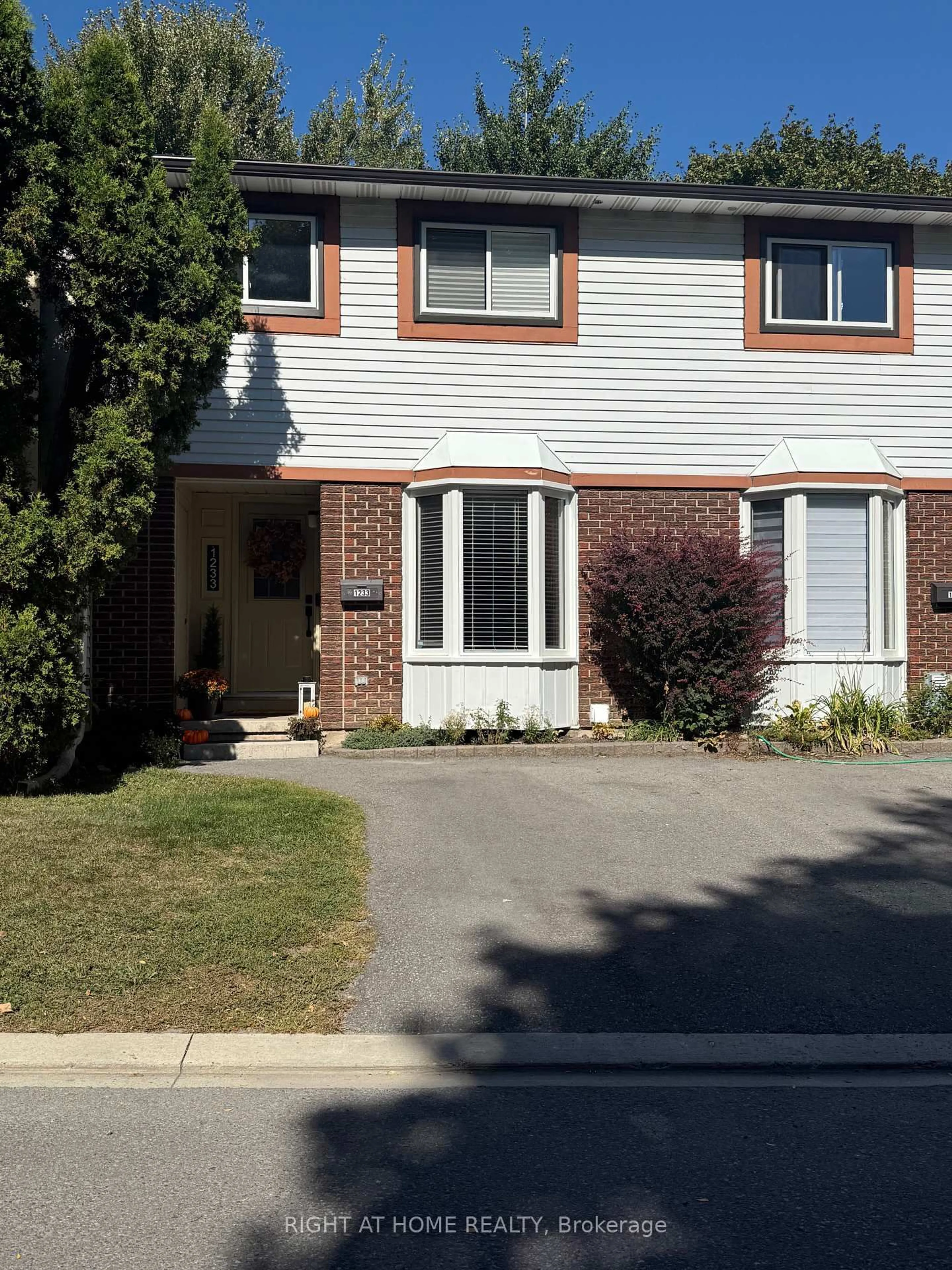 Home with brick exterior material, street for 1013 Cloister Gdns, Ottawa Ontario K1C 2A1
