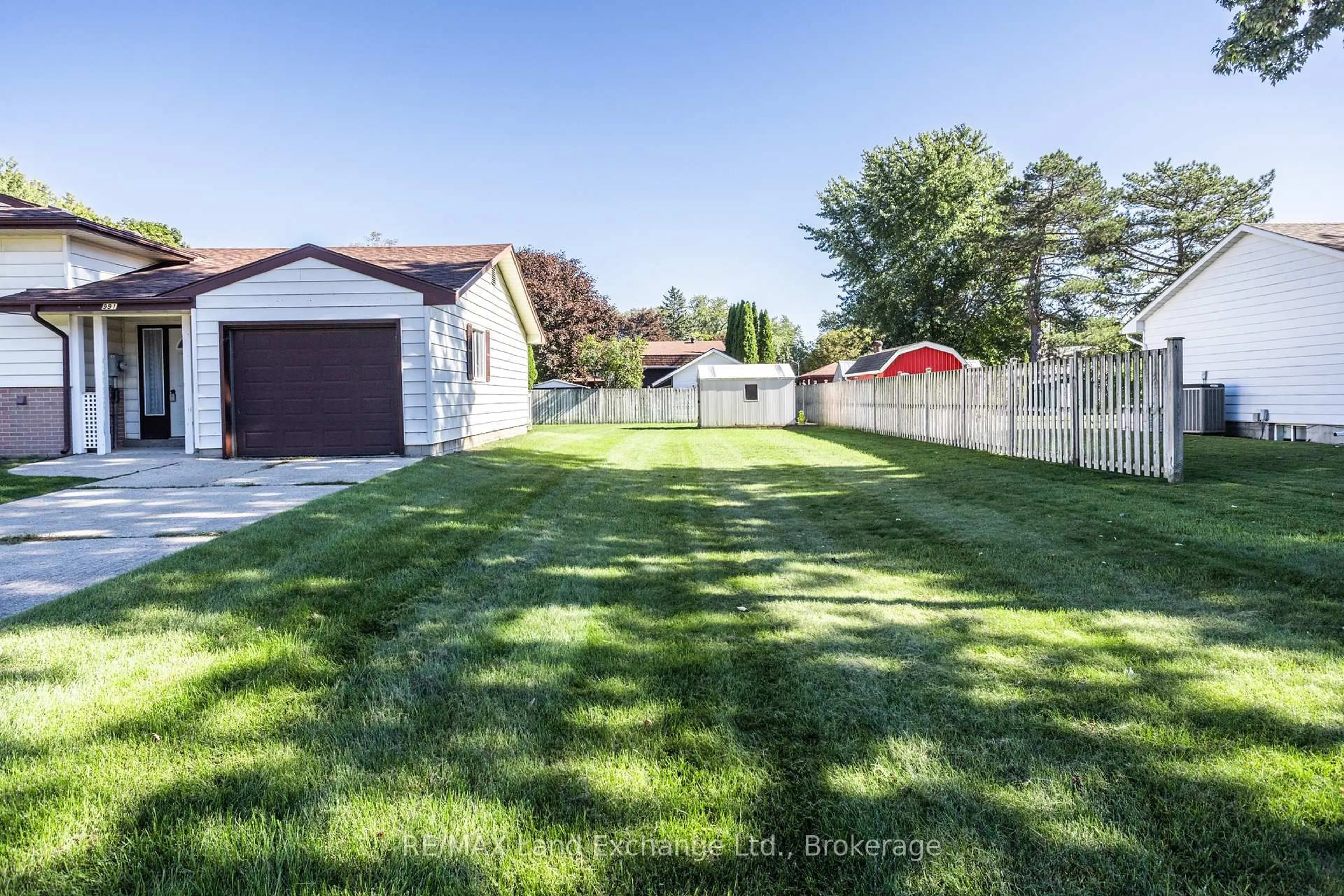 A pic from outside/outdoor area/front of a property/back of a property/a pic from drone, street for 991 Bricker St, Saugeen Shores Ontario N0H 2C3