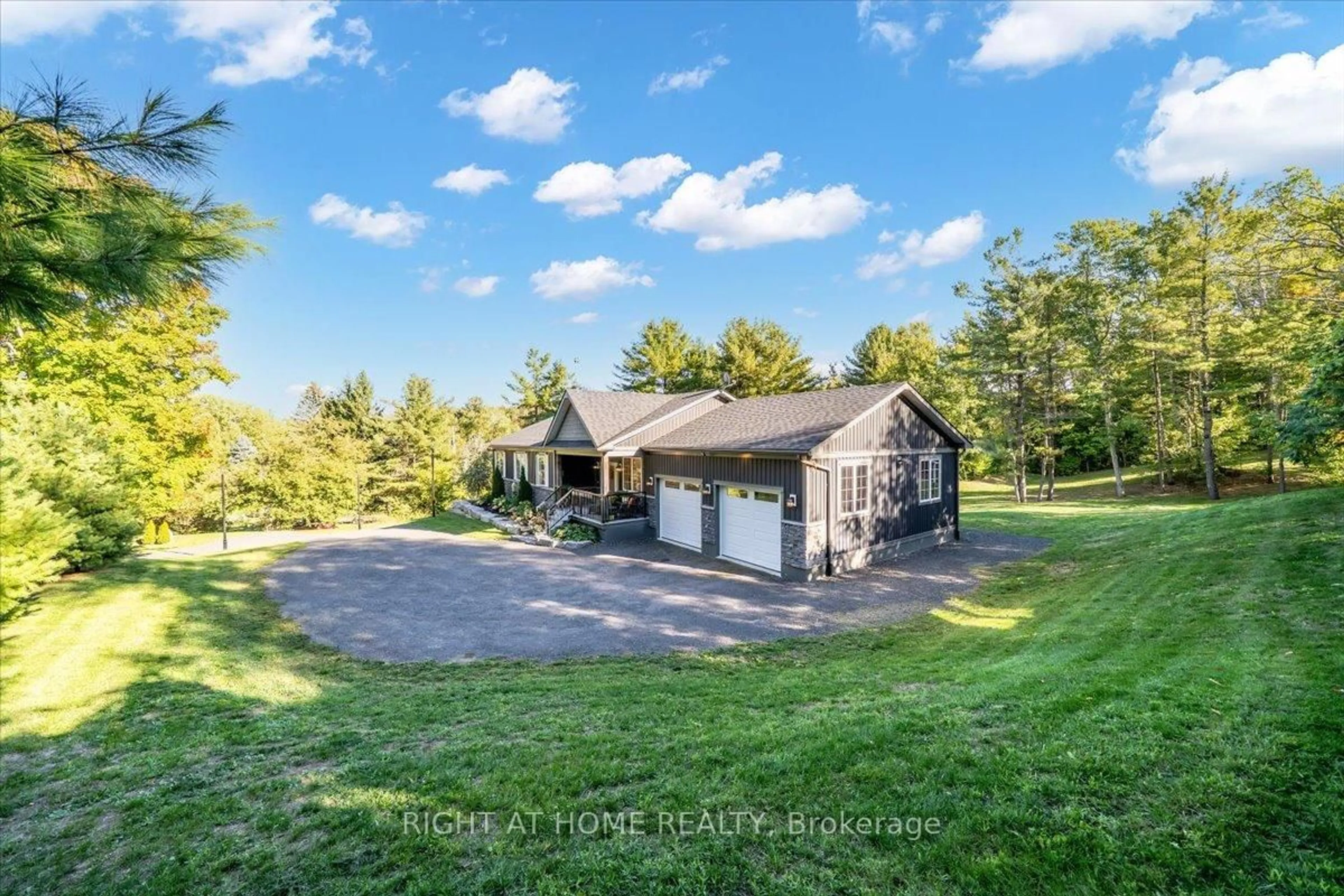 A pic from outside/outdoor area/front of a property/back of a property/a pic from drone, water/lake/river/ocean view for 6521 9th Line, Port Hope Ontario K0L 1B0