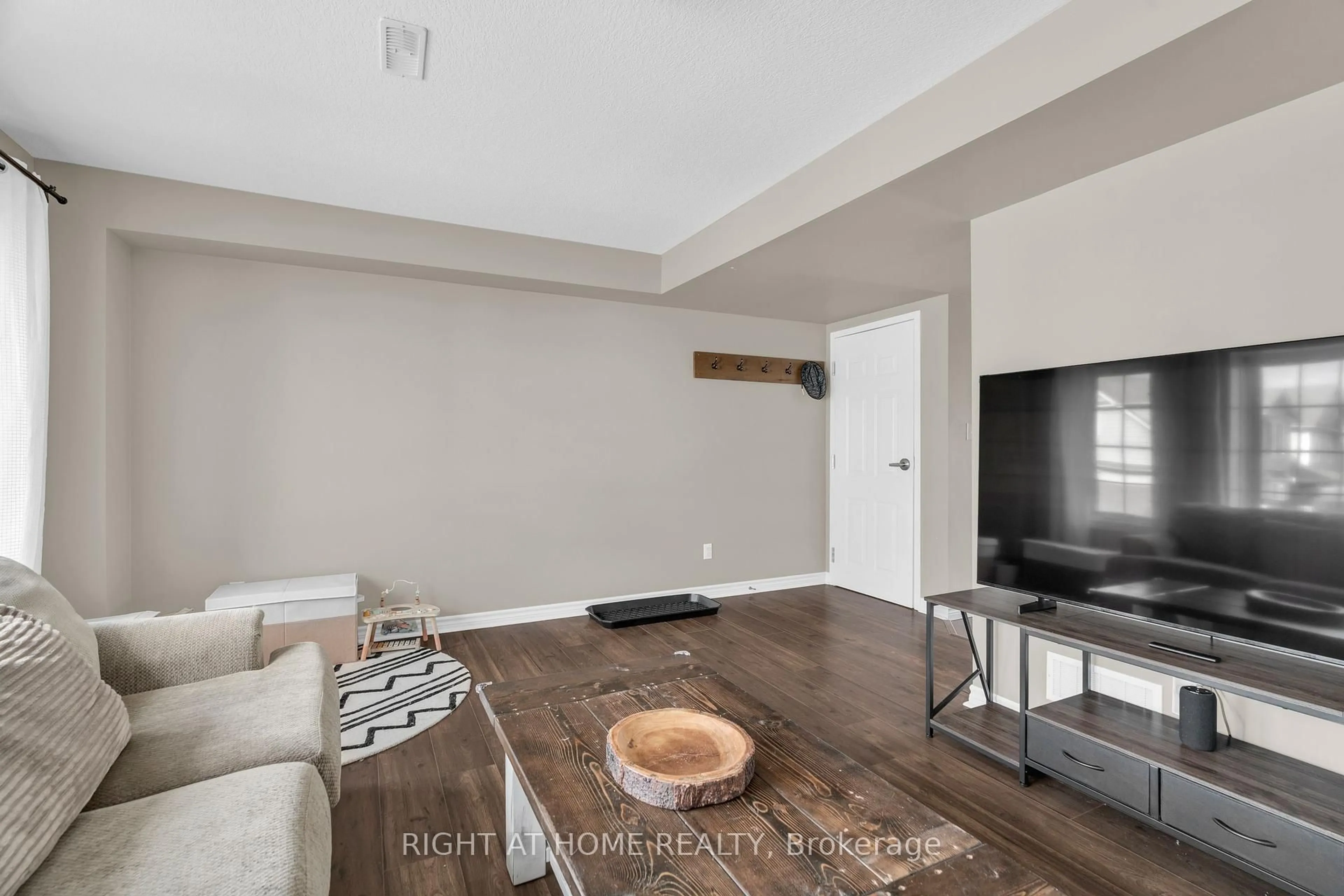 Living room with furniture, unknown for 630 Woodlawn Rd #B, Guelph Ontario N1E 0K4