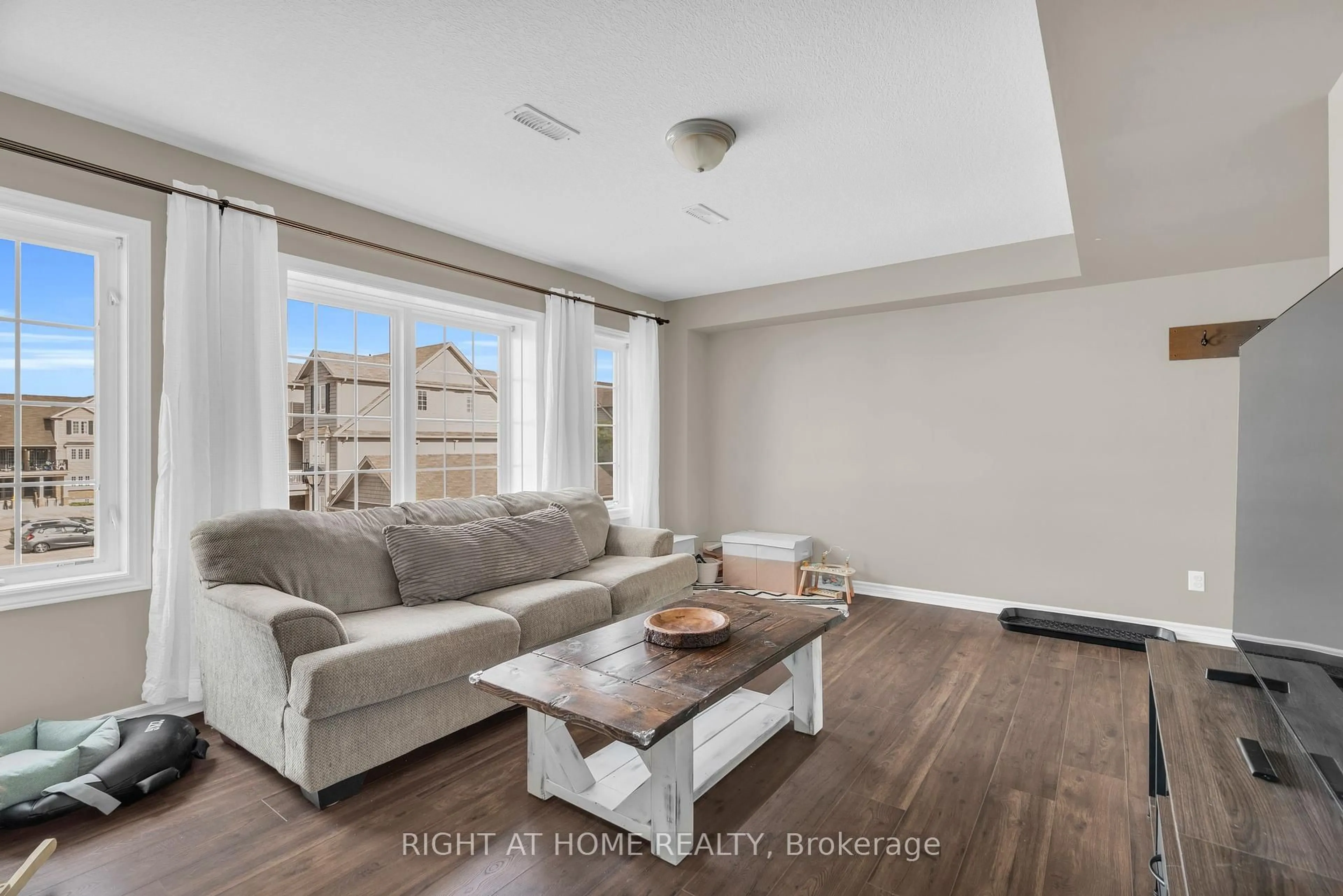 Living room with furniture, unknown for 630 Woodlawn Rd #B, Guelph Ontario N1E 0K4