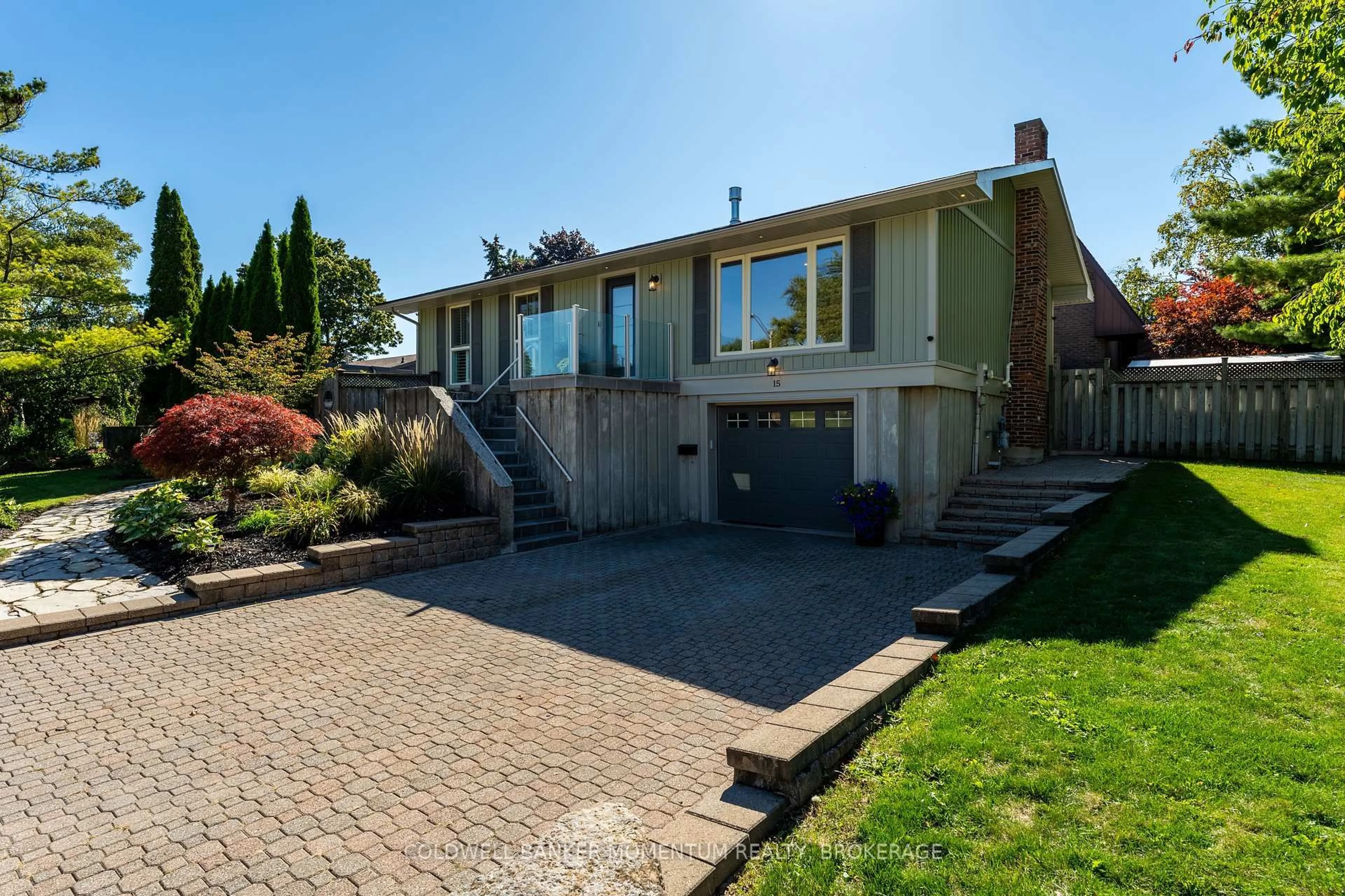 Home with vinyl exterior material, street for 15 The Cedars, St. Catharines Ontario L2M 6M7