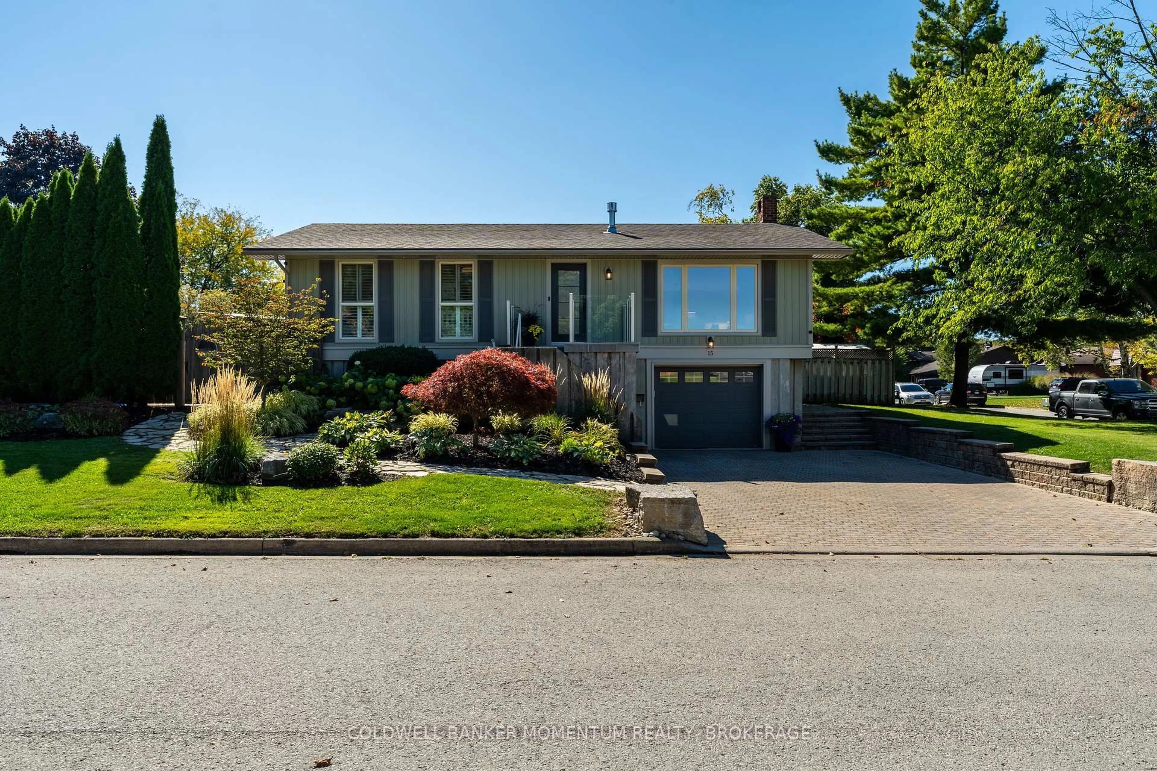 Home with vinyl exterior material, street for 15 The Cedars, St. Catharines Ontario L2M 6M7