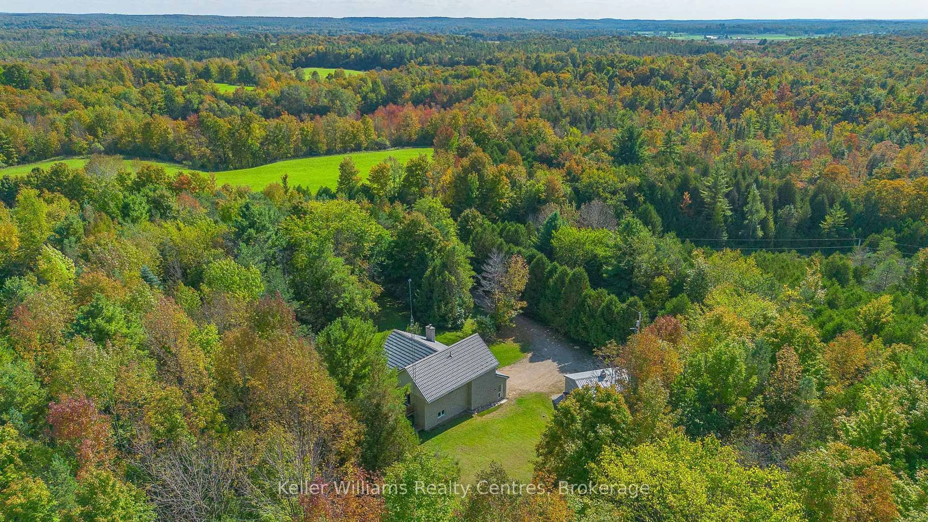 A pic from outside/outdoor area/front of a property/back of a property/a pic from drone, forest/trees view for 702473 Sideroad 5, Chatsworth Ontario N0H 1K0
