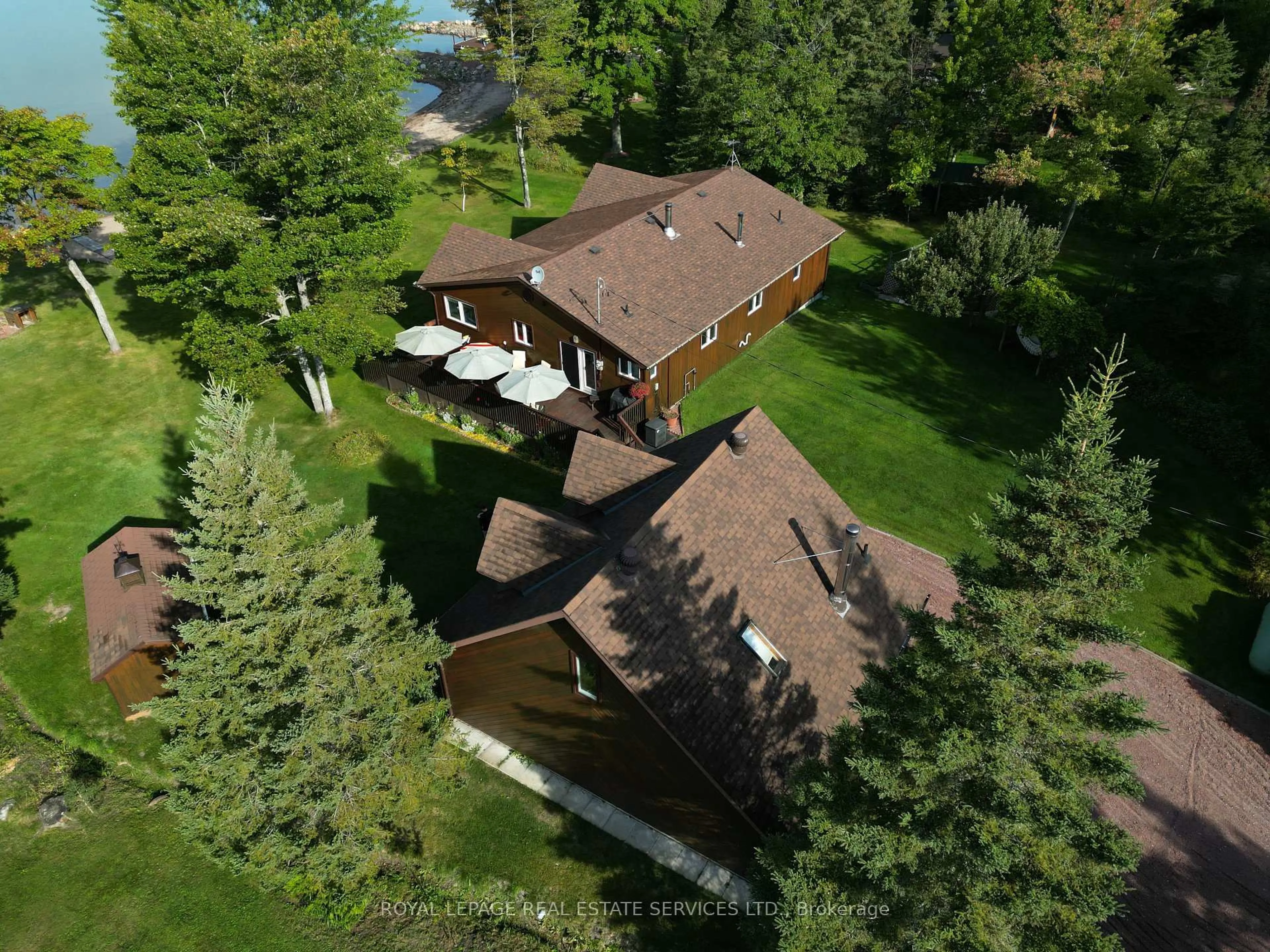 A pic from outside/outdoor area/front of a property/back of a property/a pic from drone, unknown for 525 Riverside Dr, St. Joseph Ontario P0R 1J0