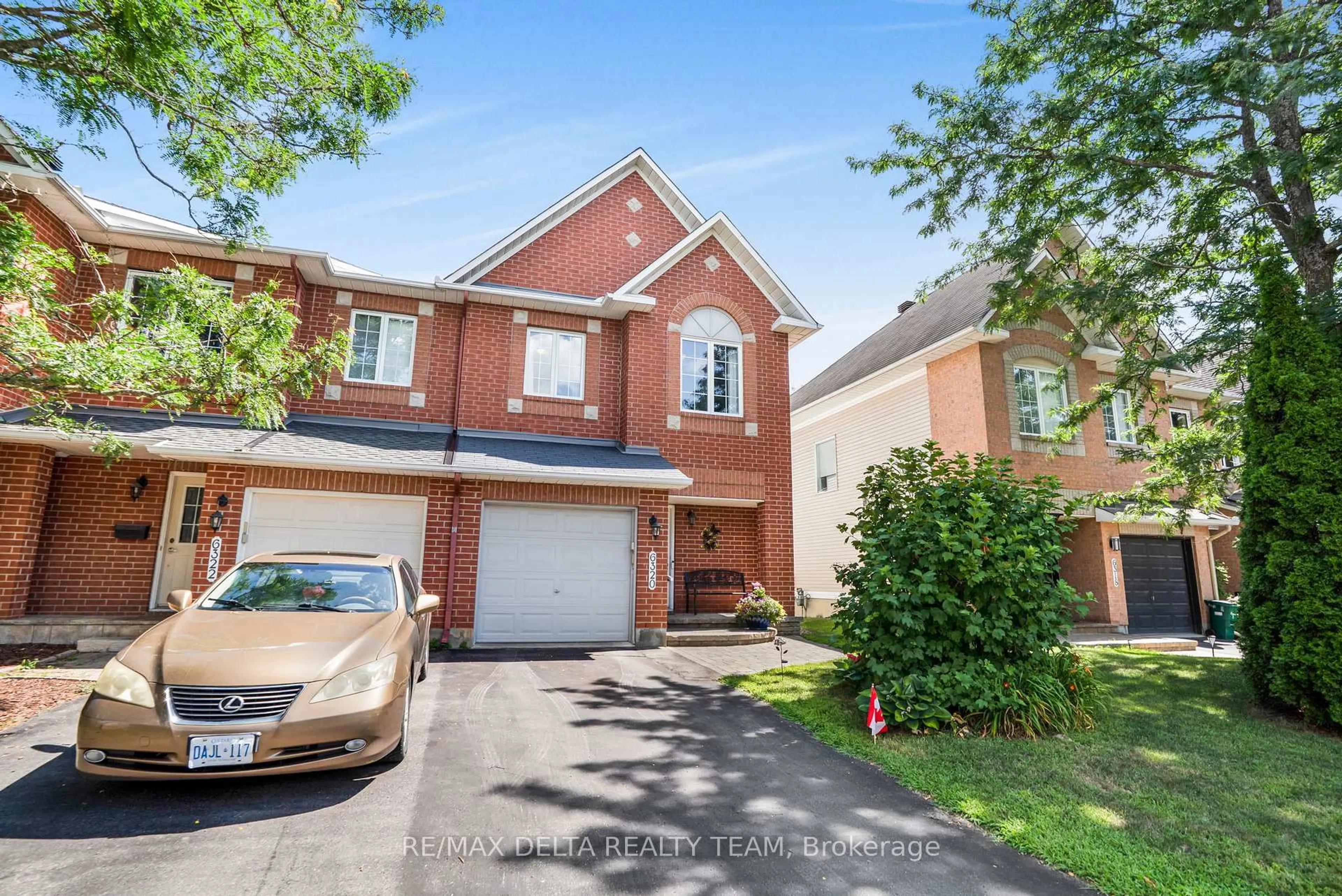 Home with brick exterior material, street for 6320 Sablewood Pl, Ottawa Ontario K1C 7M6