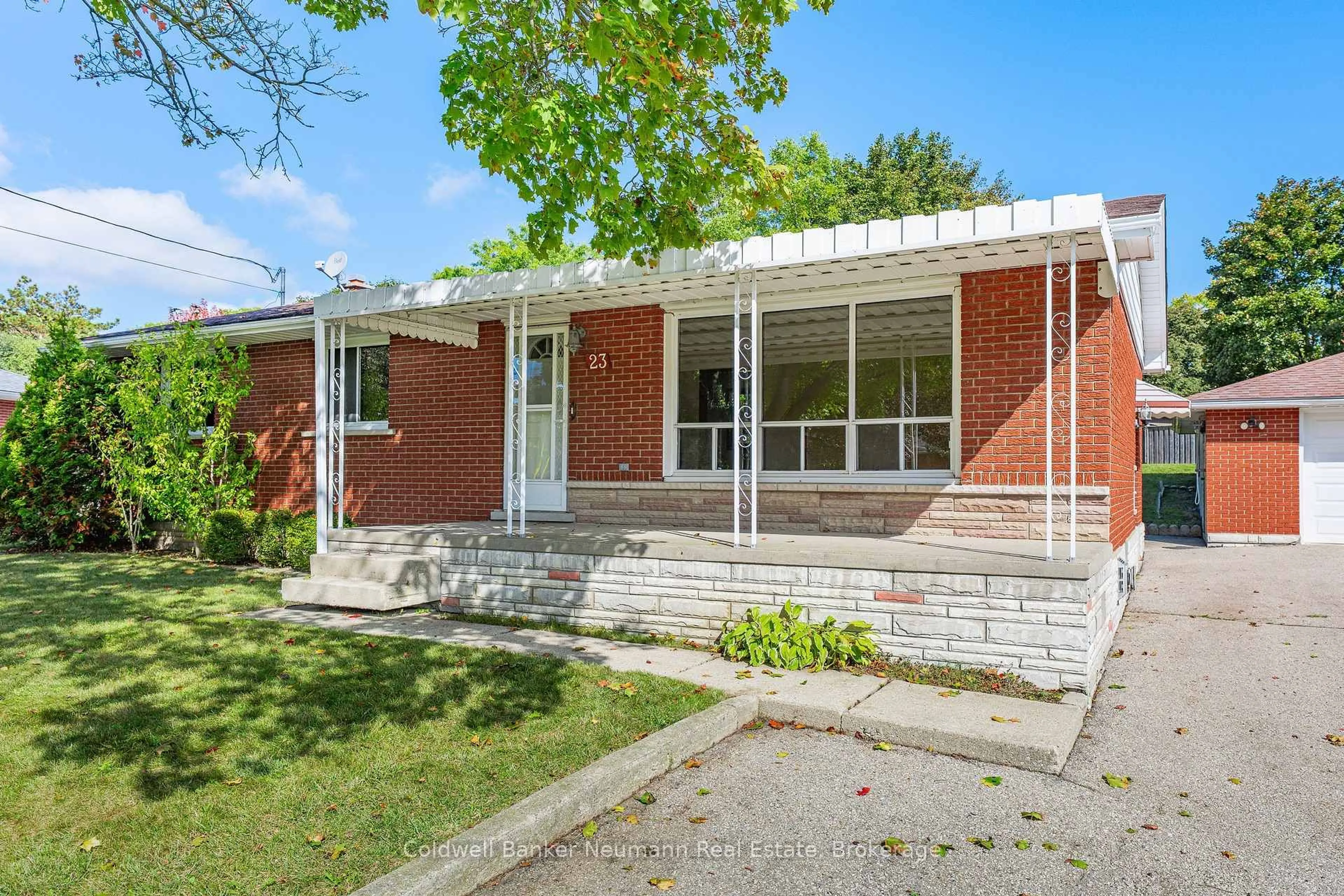 Home with brick exterior material, street for 23 Sunnylea Cres, Guelph Ontario N1E 1W3