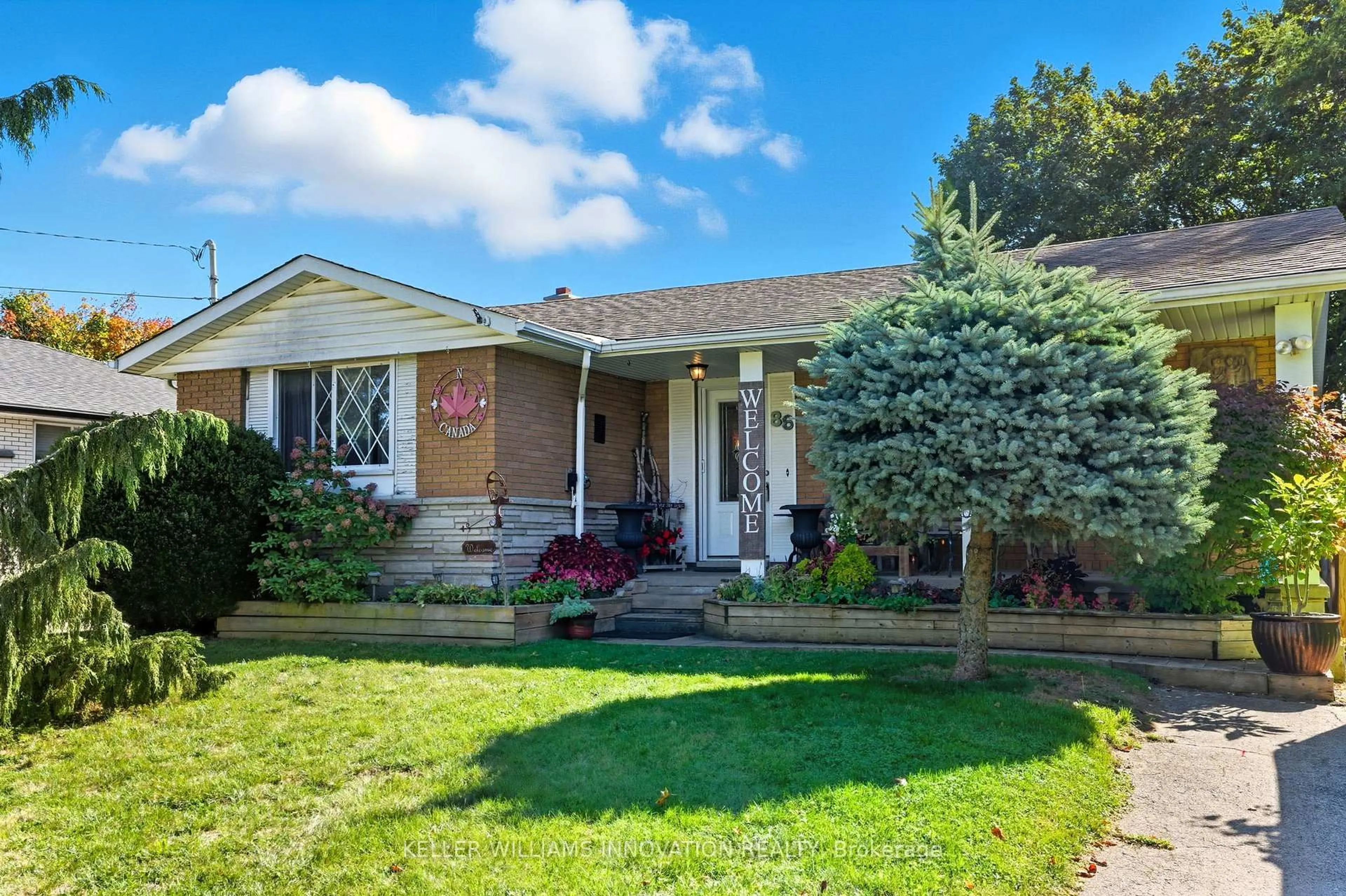 Home with brick exterior material, street for 86 Balmoral Dr, Guelph Ontario N1E 3N6