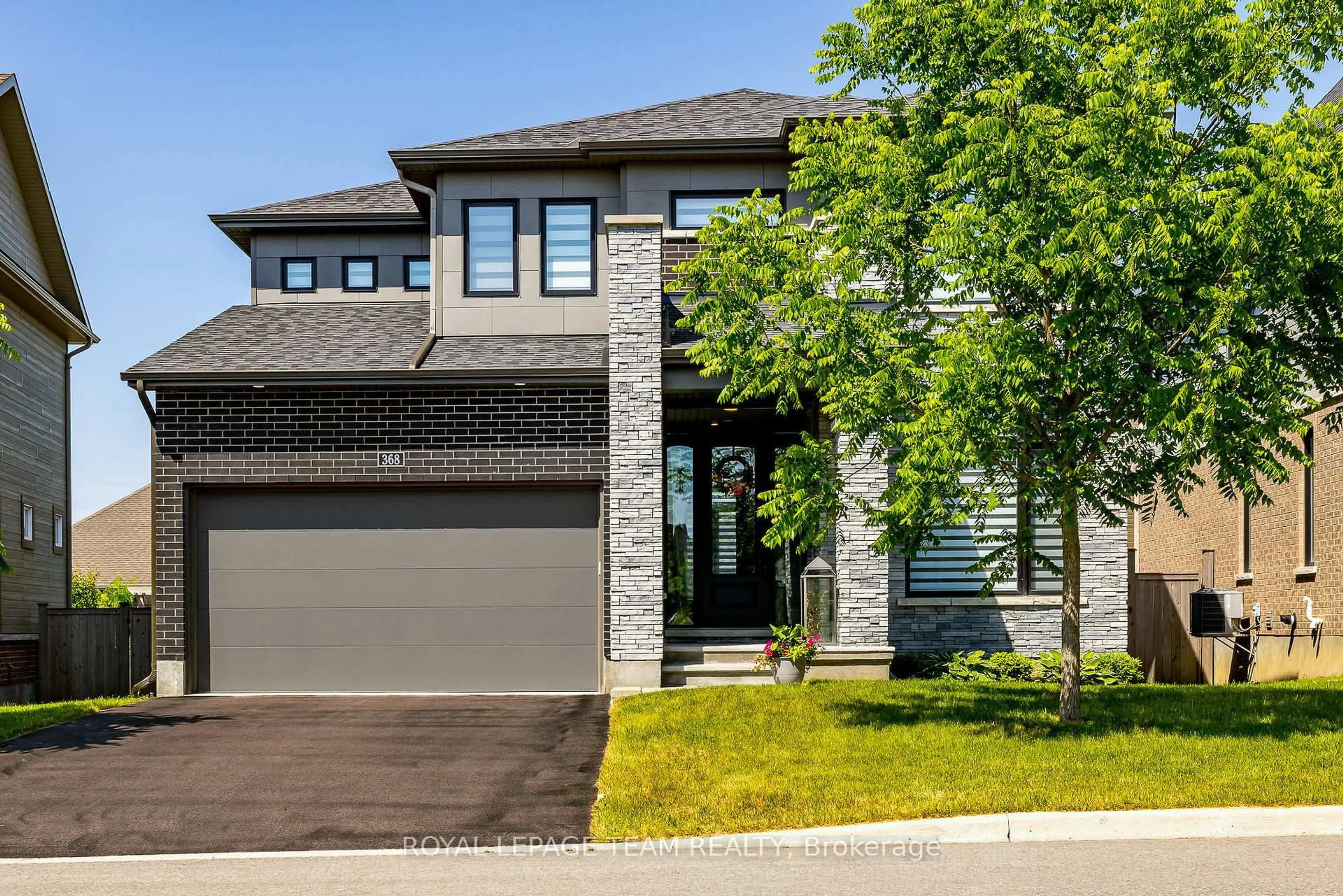 Home with brick exterior material, street for 368 Trestle St, Manotick Ontario K4M 0G4