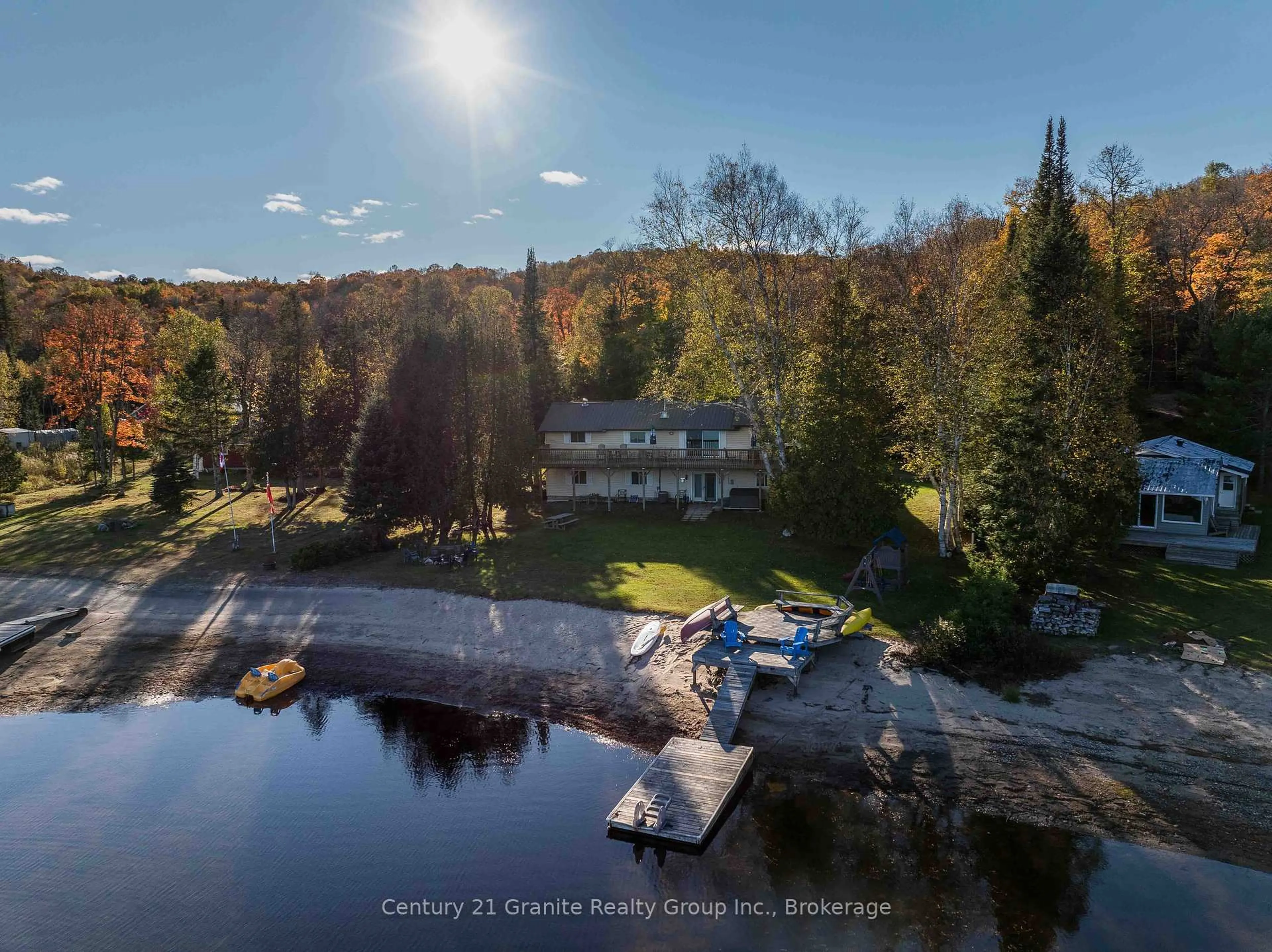 A pic from outside/outdoor area/front of a property/back of a property/a pic from drone, water/lake/river/ocean view for 1317 Sullivan Dr, Dysart et al Ontario K0M 1S0