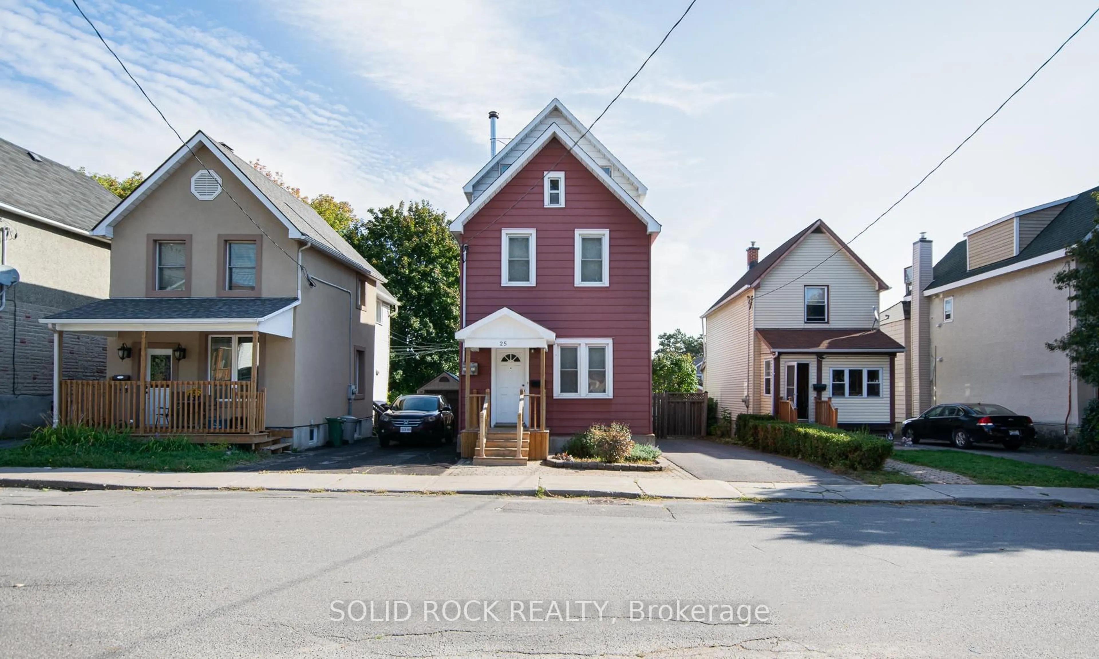 A pic from outside/outdoor area/front of a property/back of a property/a pic from drone, street for 25 Champagne Ave, Ottawa Ontario K1S 4P1