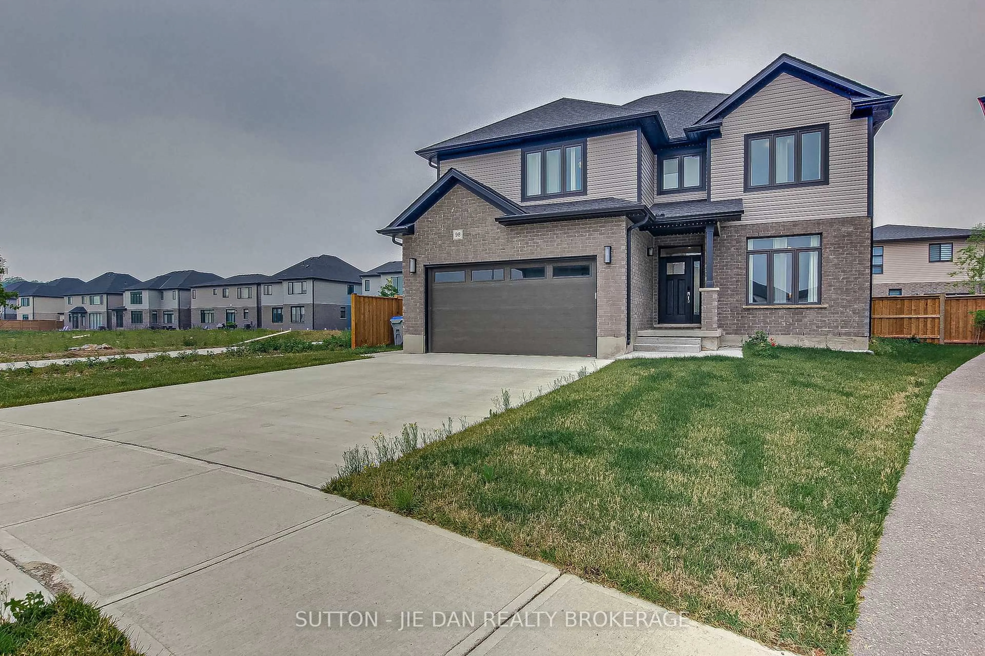 Home with brick exterior material, street for 98 Locky Lane, Middlesex Centre Ontario N0L 1R0