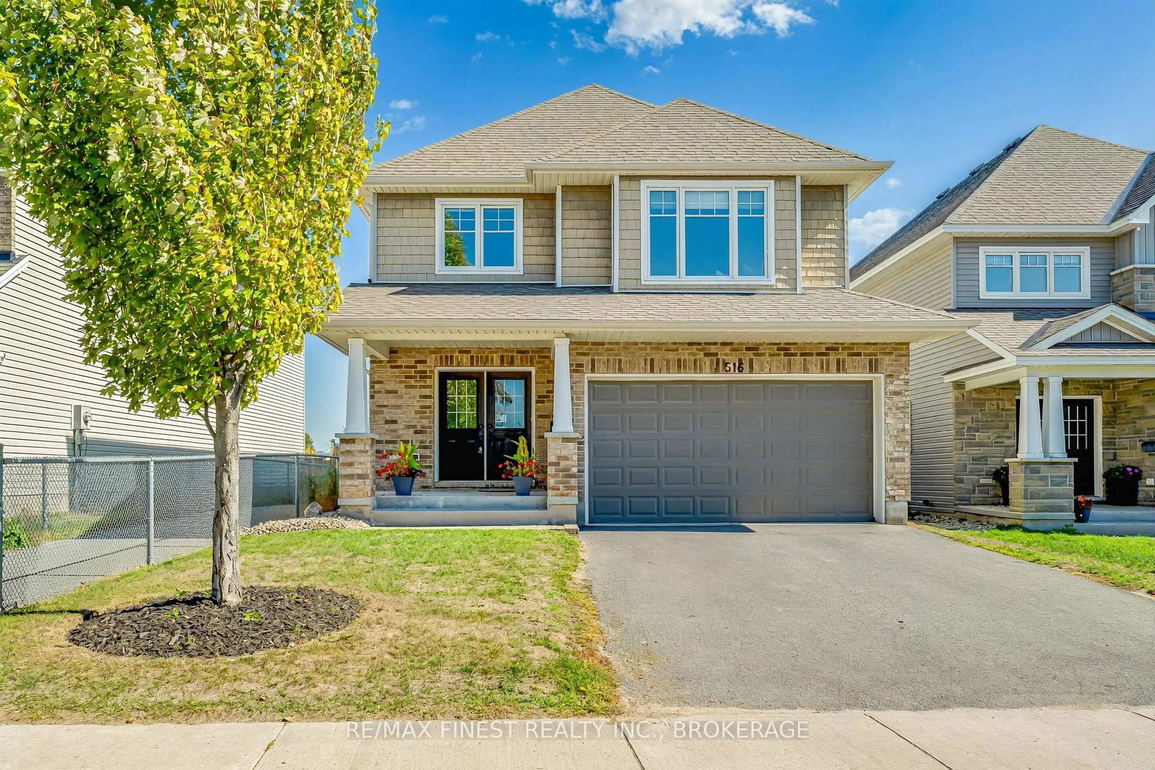 Home with brick exterior material, street for 516 Savannah Crt, Kingston Ontario K7P 0C4