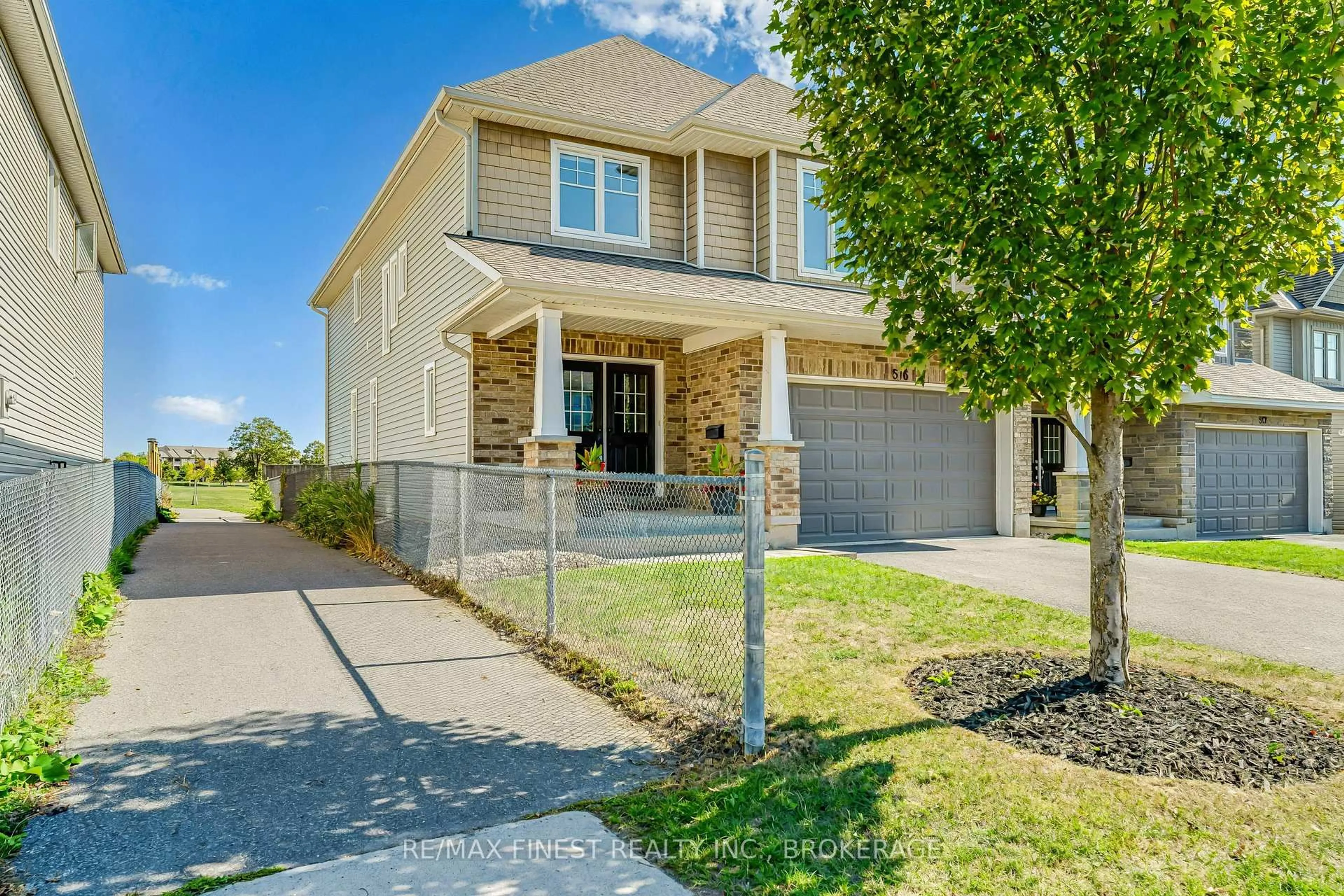 Home with brick exterior material, street for 516 Savannah Crt, Kingston Ontario K7P 0C4
