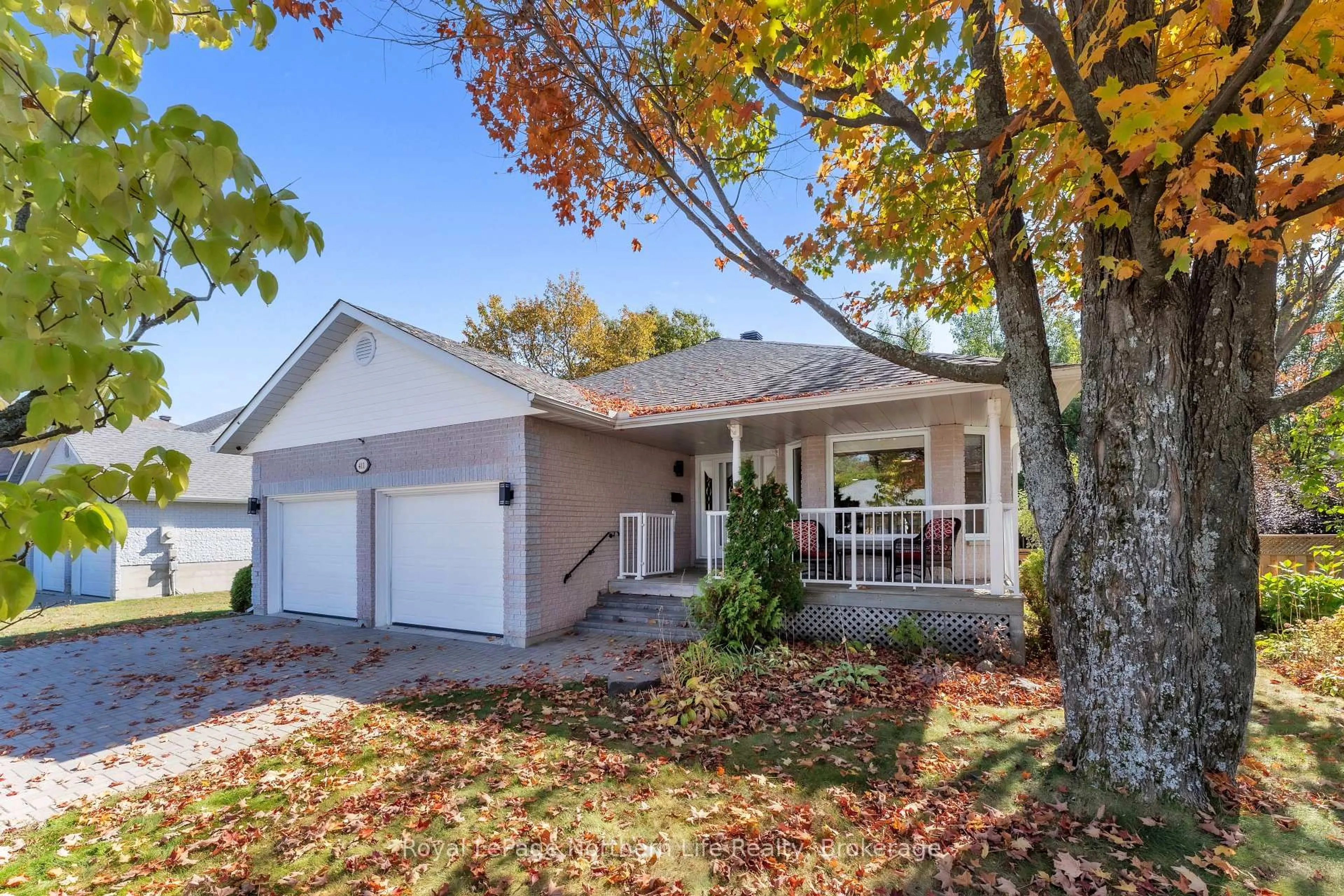 Home with vinyl exterior material, street for 411 PEARCE St, North Bay Ontario P1C 1M8
