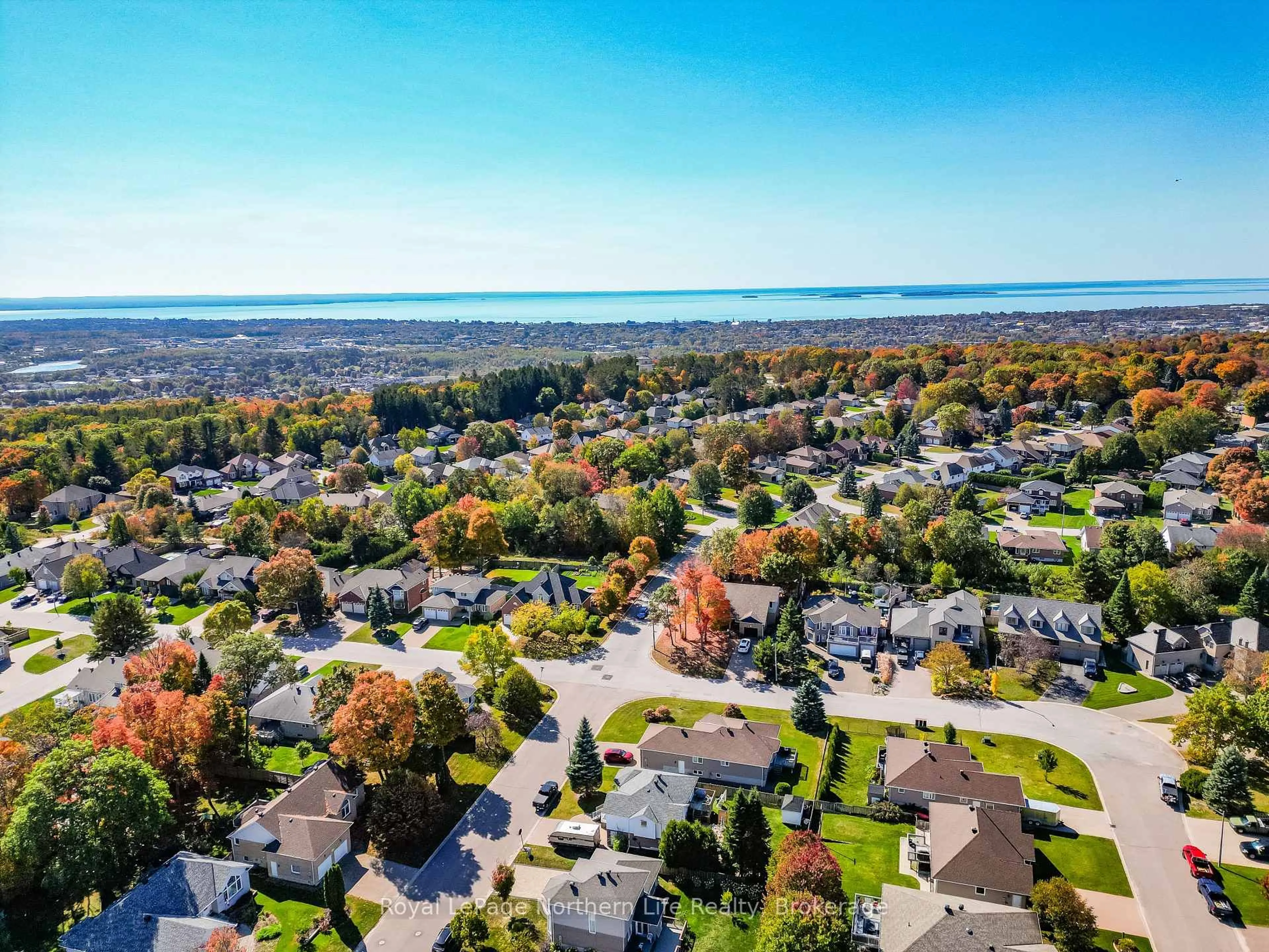 A pic from outside/outdoor area/front of a property/back of a property/a pic from drone, water/lake/river/ocean view for 411 PEARCE St, North Bay Ontario P1C 1M8